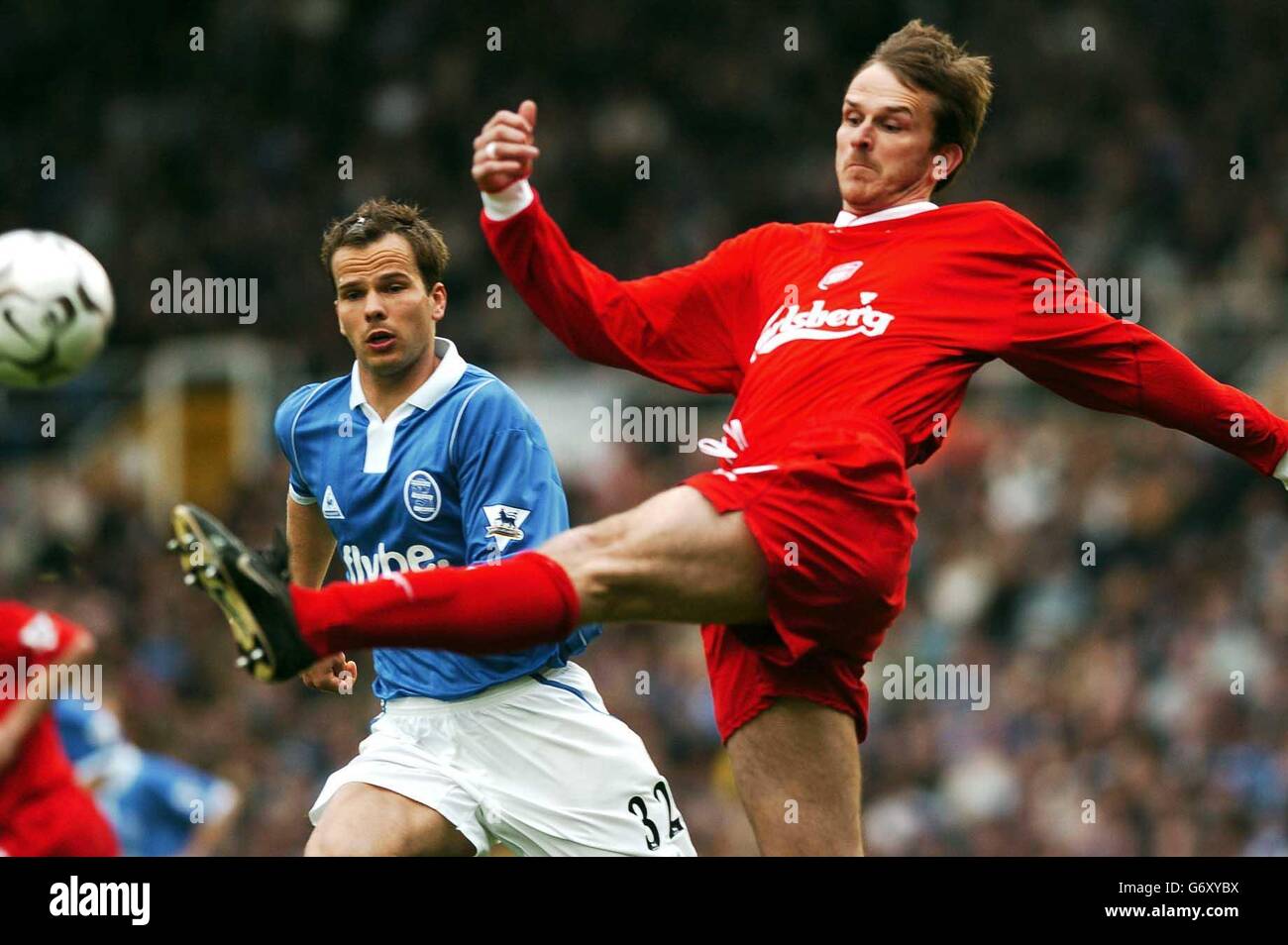 Liverpools Dietmar Hamaan (right) clears from Birmingham's Stephen Clemence, during their Barclaycard Premiership match at St Andrews, Birmingham. Stock Photo