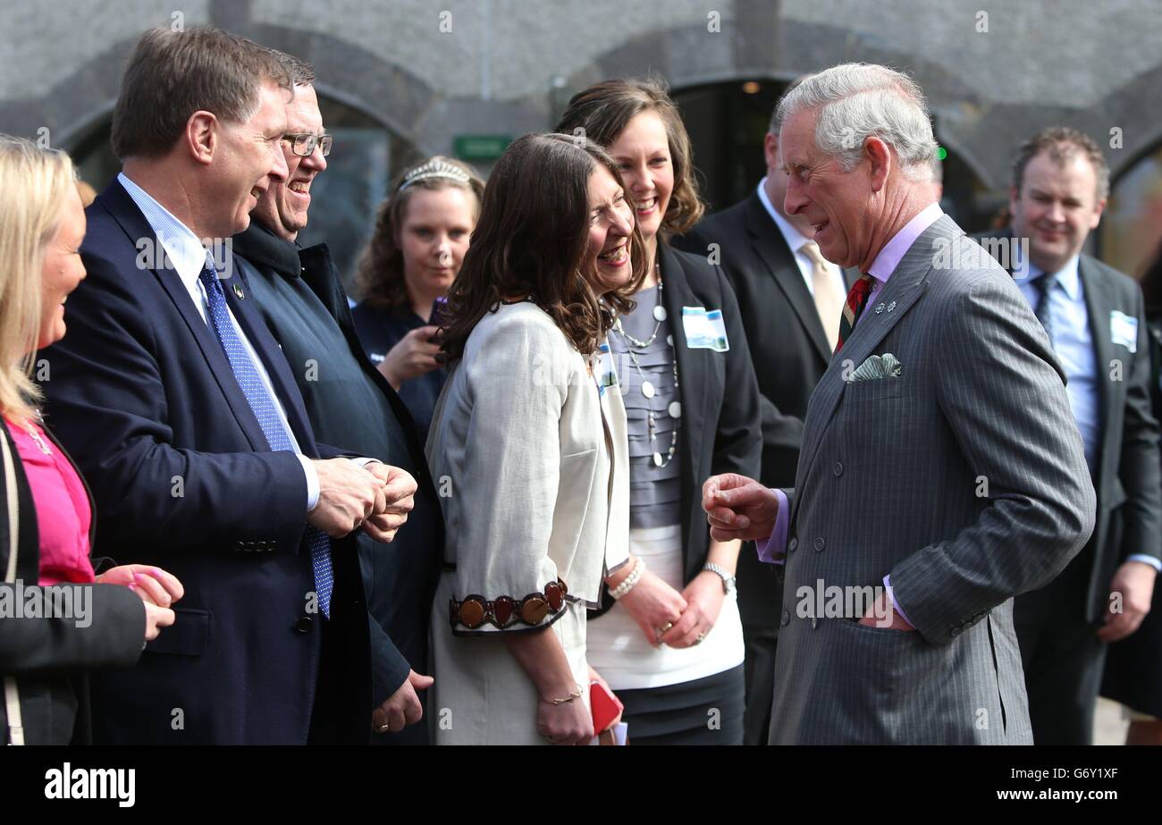 The Prince of Wales (right) chats with staff at Enniskillen Castle museum at the beginning of a two day visit to Northern Ireland. Stock Photo