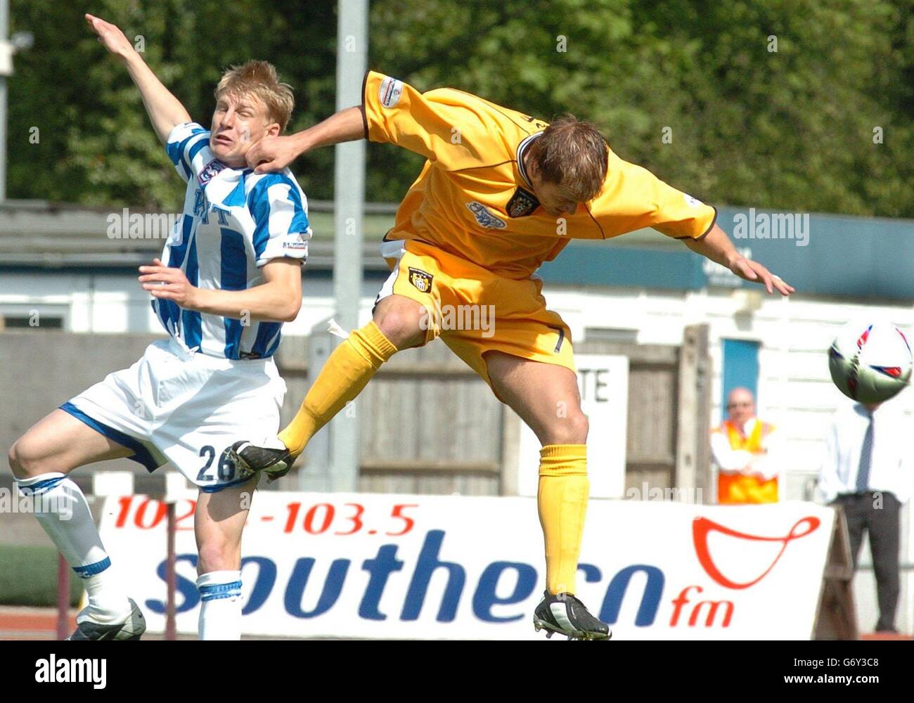 Dan Harding Brighton (left) challanges for the ball against David Pipe Notts Couny for Brighton in the Nationwide Division 2, Brighton V Notts County game from The Withdean Stadium, Brighton. Stock Photo