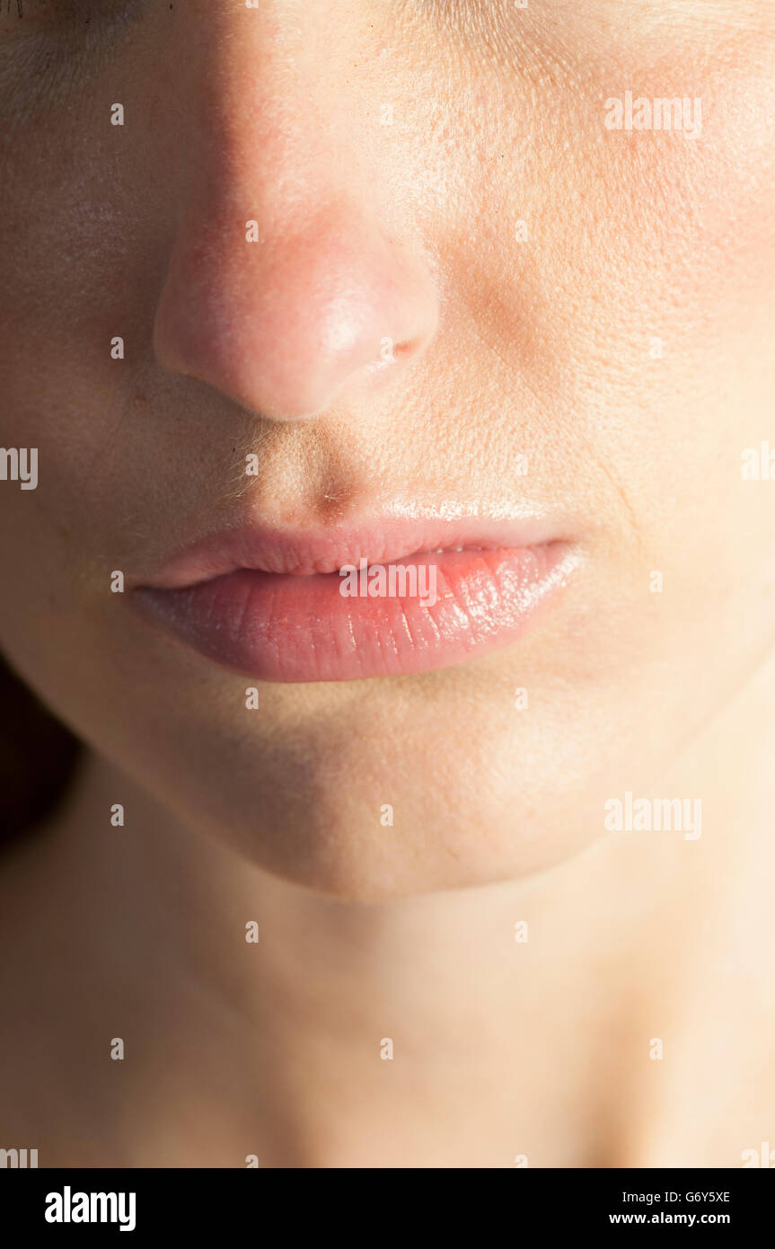 Close up of a woman's nose and mouth Stock Photo