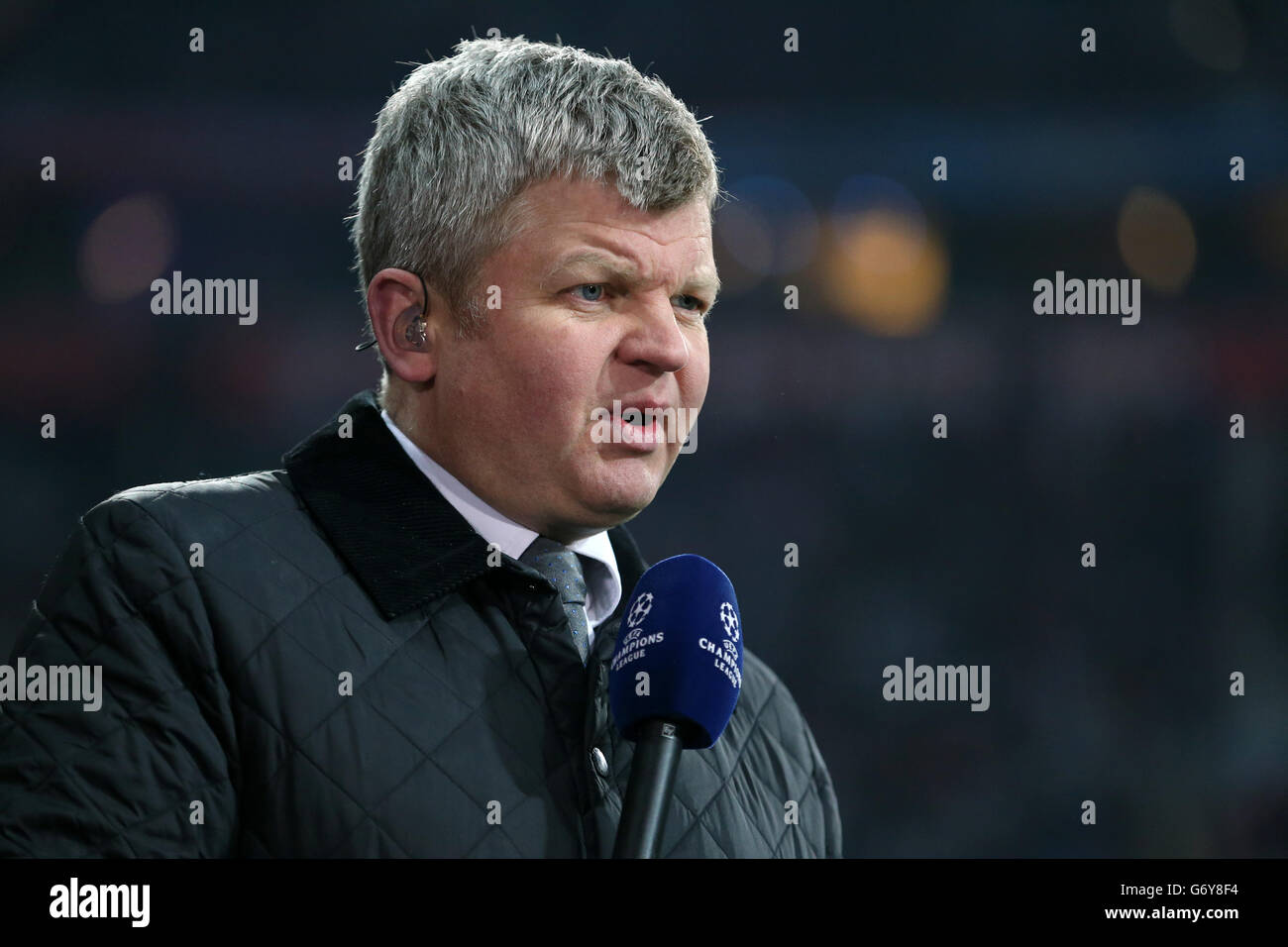 Soccer - UEFA Champions League - Round of 16 - Second Leg - Bayern Munich v Arsenal - Allianz Arena. ITV Sport presenter Adrian Chiles before the game Stock Photo