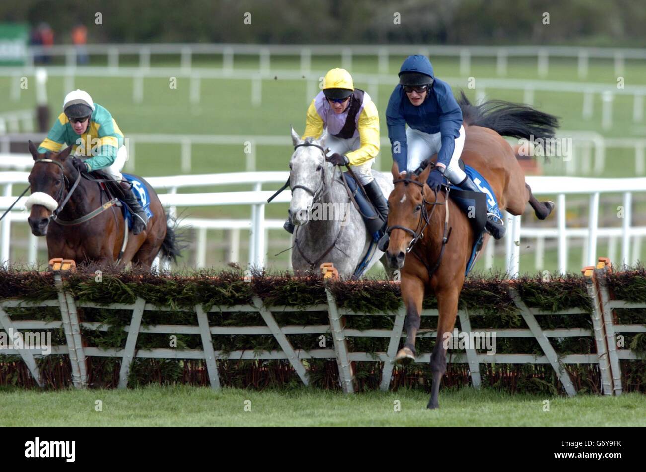 John Magnier on Rhinestone Cowboy (right) has a scare at the last but wins the Ballymore Properties Champion Stayers Hurdle at Punchestown. Stock Photo