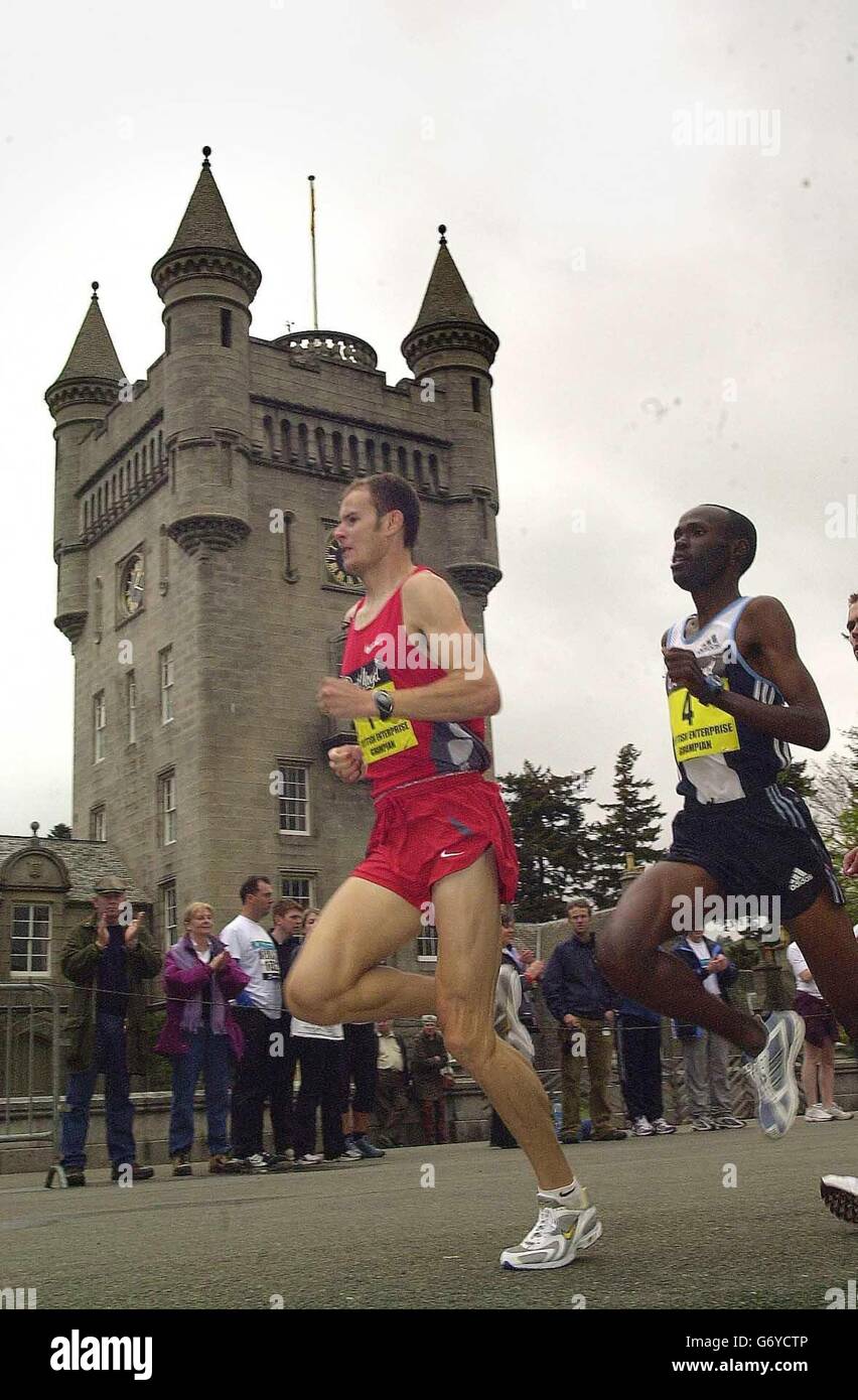 Mike East on his way to victory in the Men's Mile race at Balmoral. Stock Photo