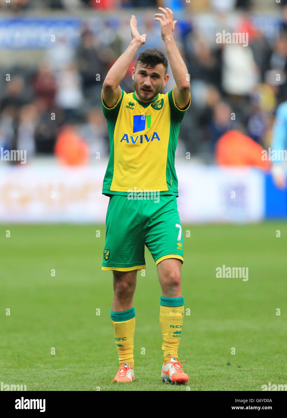 Norwich City's Robert Snodgrass shows his dejection after their defeat during the Barclays Premier League match at the Liberty Stadium, Swansea. PRESS ASSOCIATION Photo. Picture date: Saturday March 29, 2014. See PA Story SOCCER Swansea. Photo credit should read: Nick Potts/PA Wire. Maximum 45 images during a match. No video emulation or promotion as 'live'. No use in games, competitions, merchandise, betting or single club/player services. No use with unofficial audio, video, data, fixtures or club/league logos. Stock Photo
