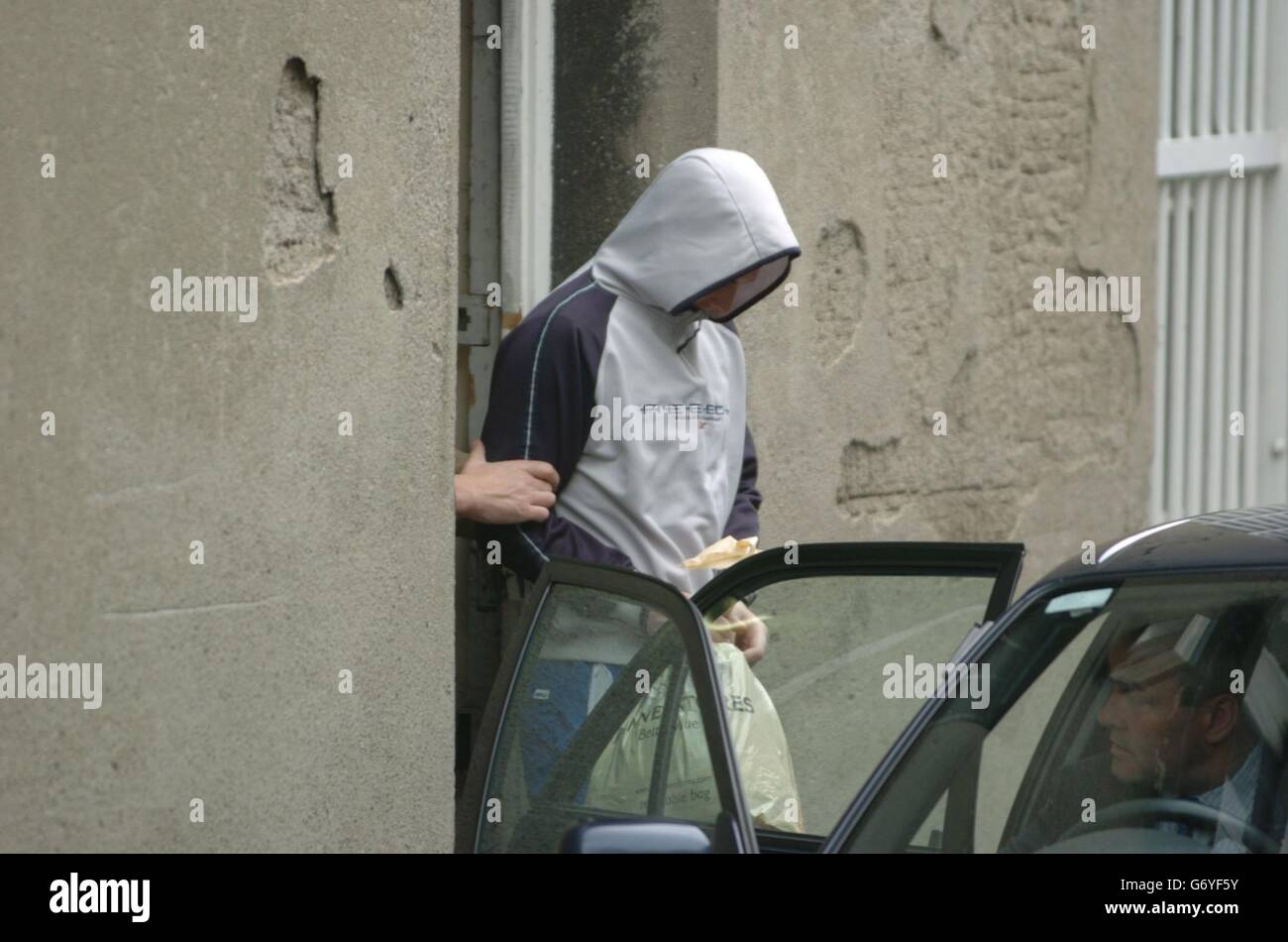 Thomas Hinchon, 24, leaving Kilmainham District Court, where he and Brian Kenny, 34, were charged with murder of Jonathan O'Reilly, who was shot outside Dublin's Cloverhill prison on April 17. O'Reilly had recently been released from jail after serving a five year sentence for drugs offences and was involved with a well-known Dublin drug-dealing gang. Stock Photo