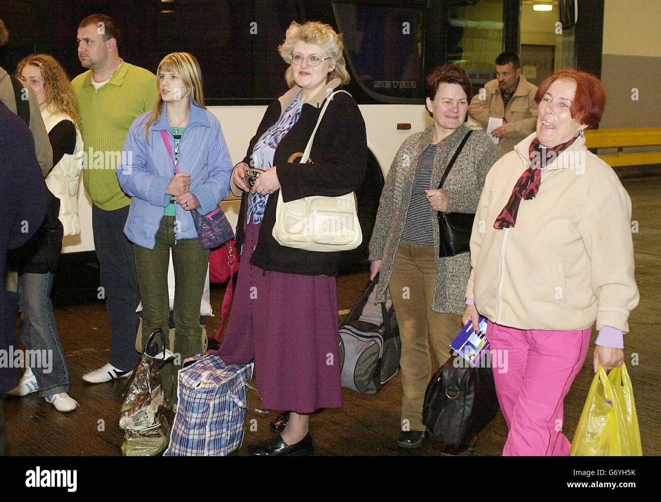 People from Lithuania arrive at Victoria Coach Station, on the day that the country joined the European Union. Migrant workers from the new countries joining the European Union today are to be given information from the TUC about their rights if they find work in the UK. The union organisation said workers from the new EU countries needed straightforward advice on their rights and how they should be treated by UK companies. Stock Photo