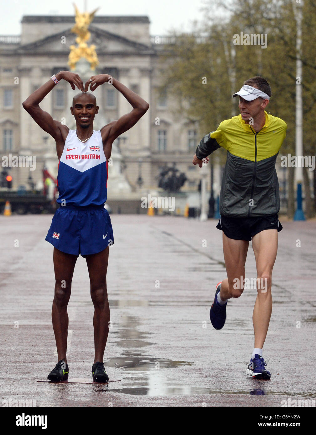 One of the two wax works of the British athlete Mo Farah stand in The Mall in London today before they are taken to Madame Tussauds' museums in London and Blackpool later this month. Stock Photo