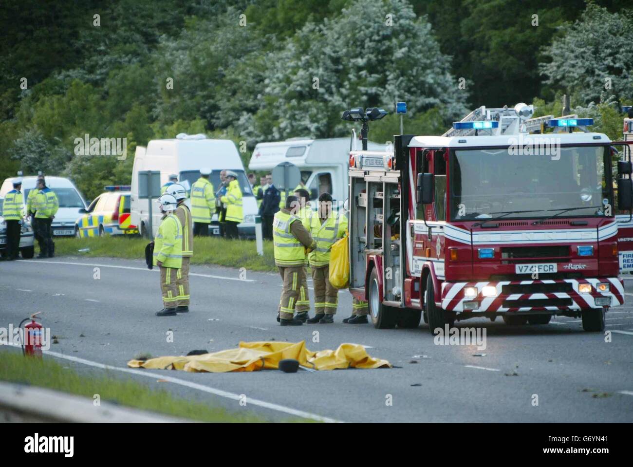 Emergency services attend the scene of a a major road accident on the north-bound carriageway of the A23 at Pyecombe near Brighton, where six people were killed. Stock Photo