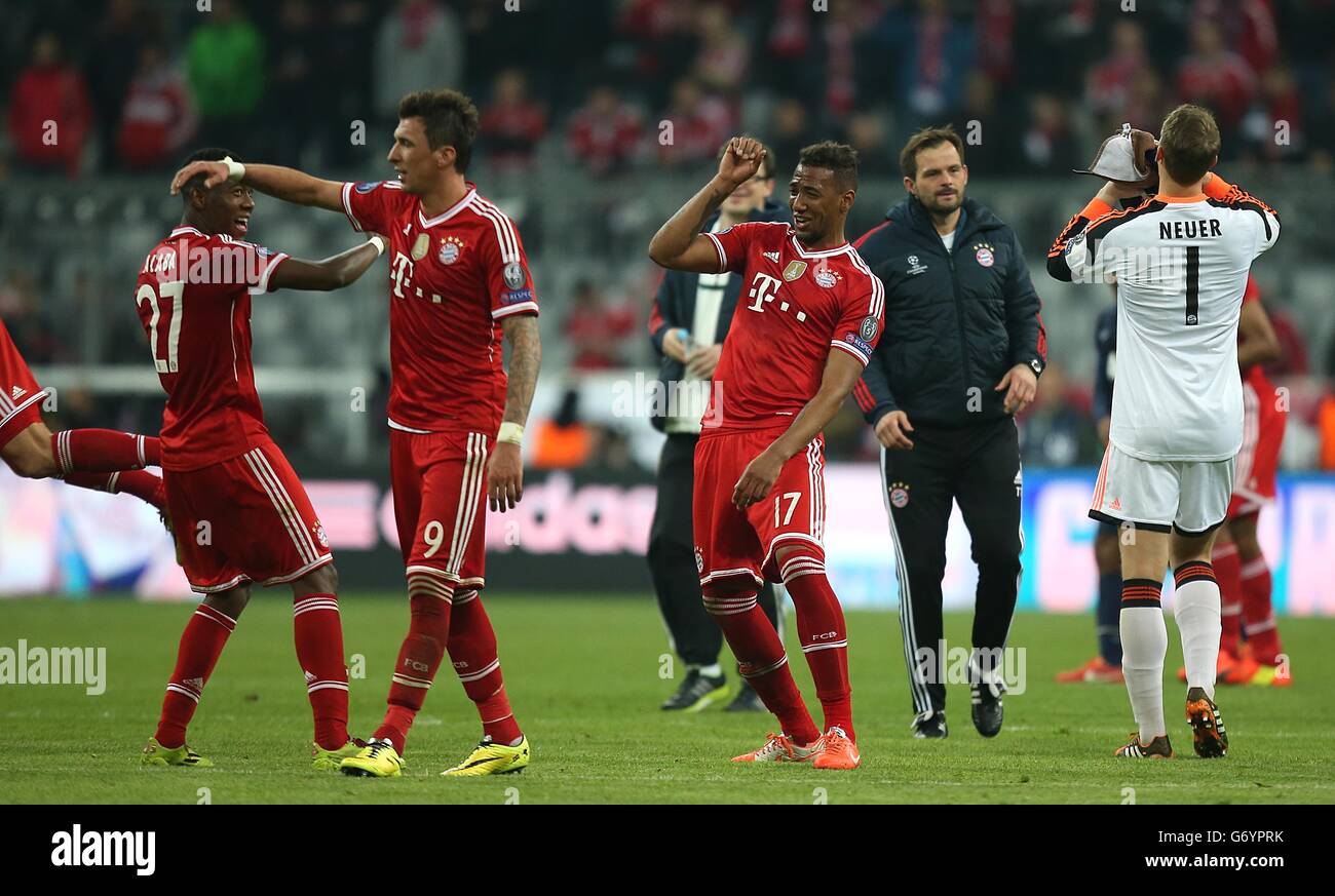 Soccer - UEFA Champions League - Quarter Final - Second Leg - Bayern Munich v Manchester United - Allianz Arena. Bayern Munich's Jerome Boateng (17) and David Alaba (27) celebrate after the game Stock Photo
