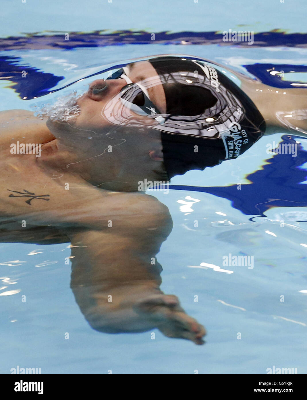Robert Renwick competes in the Mens Open 100m Backstroke heat 3 during the 2014 British Gas Swimming Championships at Tollcross International Swimming Centre, Glasgow. PRESS ASSOCIATION Photo. Picture date: Thursday April 10, 2014. Photo credit should read: Danny Lawson/PA Wire Stock Photo