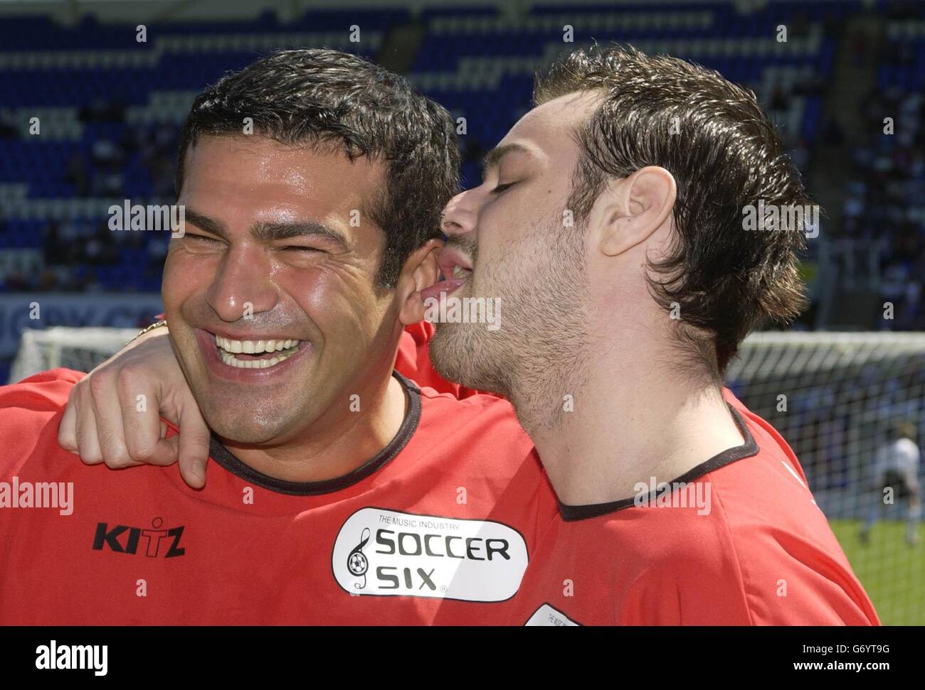 Actors Tamer Hassan (left) and Danny Dyer during the Soccer Six charity football tournament in aid of The Prince's Trust at the Madejski Stadium, home to Reading Football Club in Reading. Stock Photo