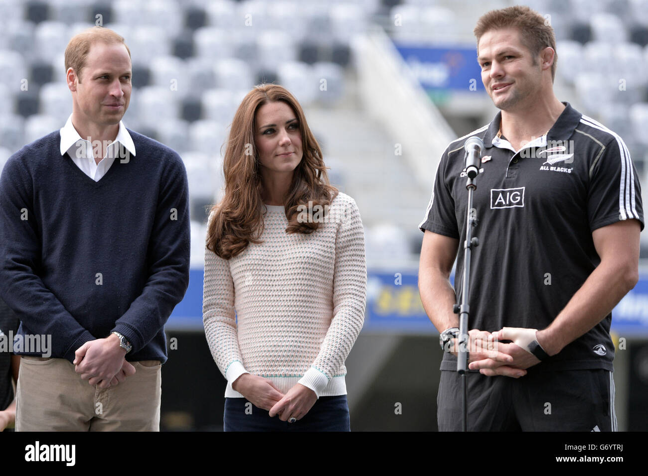 The Duke and Duchess of Cambridge listen to a speech from Richie McCaw  (right) during a Rippa Rugby tournament at the Forsyth Barr stadium in  Dunedin during the seventh day of their