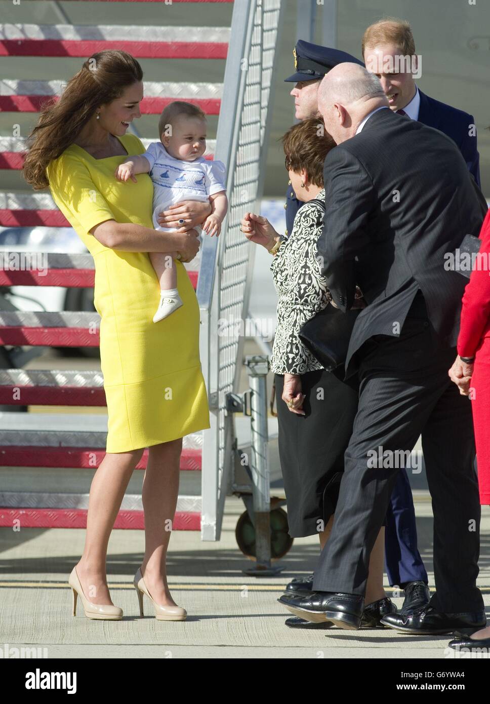 The Duke and Duchess of Cambridge and Prince George arrive at Sydney Kingsford Smith Airport on a Royal Australian Air Force aircraft during the tenth day of their official tour to New Zealand and Australia. Stock Photo