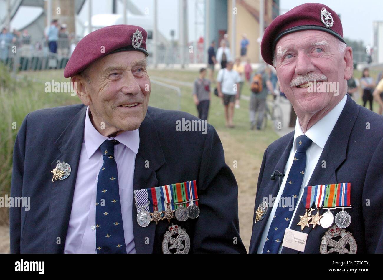 Glider pilot Geoff Barkway and, right, co-pilot/navigator Peter Boyle reminisce at the Pegasus Bridge, on the eve of the 60th anniversary of the D-Day landings. The pair crewed one of six gliders which landed at the bridge as part of the allied invasion in 1944. Stock Photo