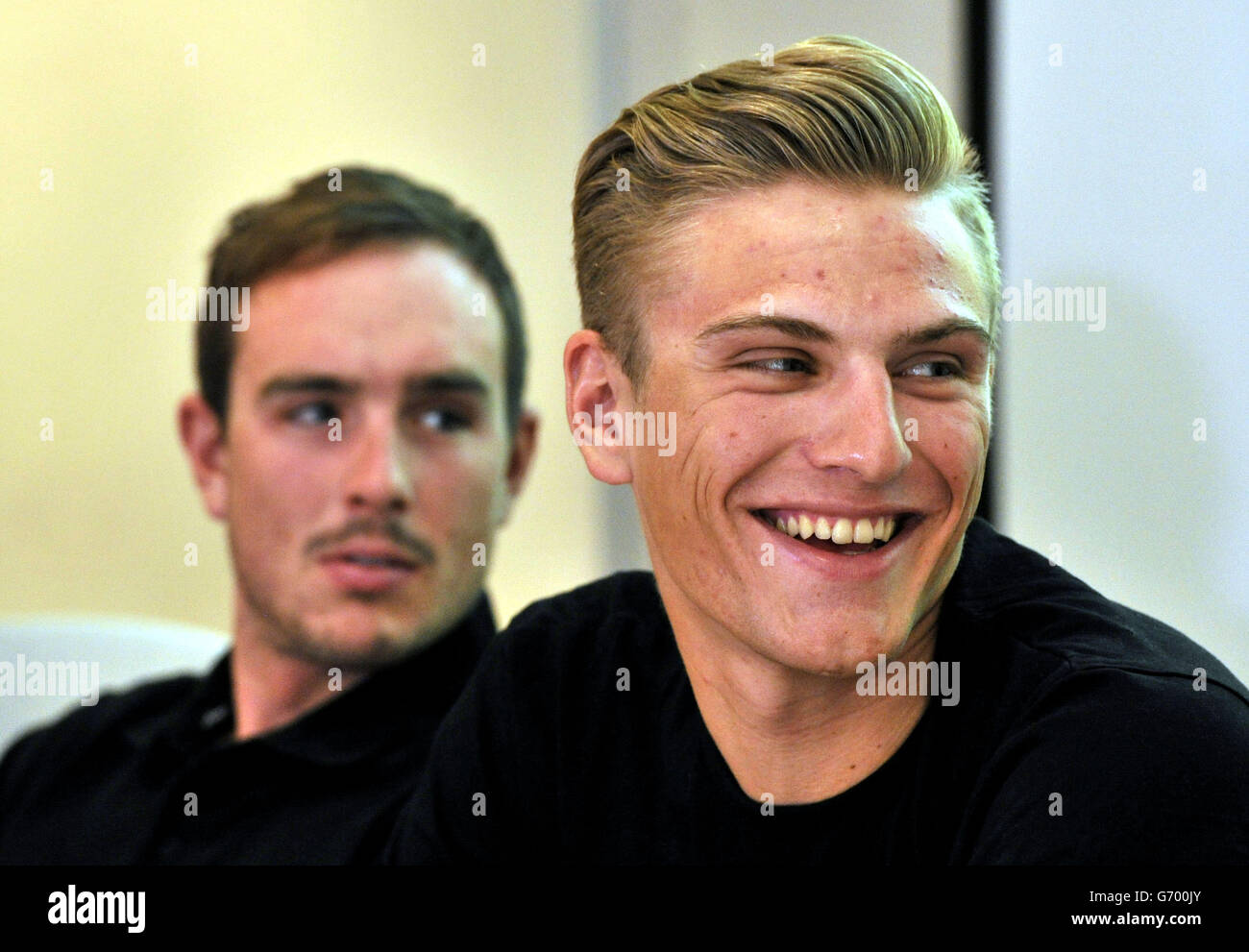 Giant Shimano Cycle Race Team members John Degenkolb and Marcel Kittel (right) during a break from training to speak to the media at Weetwood Hall Hotel, Leeds. Stock Photo