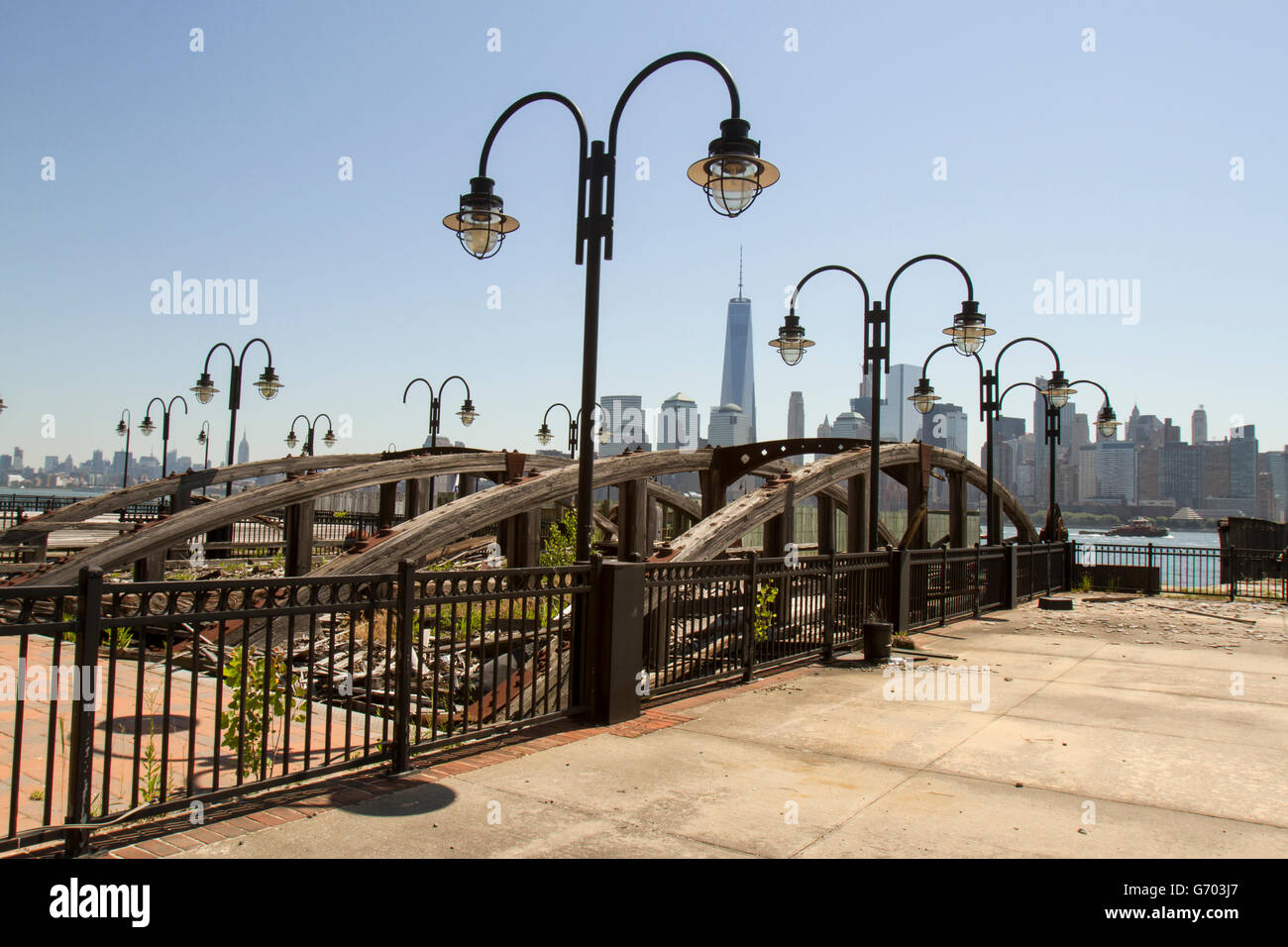 New York skyline from Jersey CIty with remains of abandoned ferry docks. Stock Photo