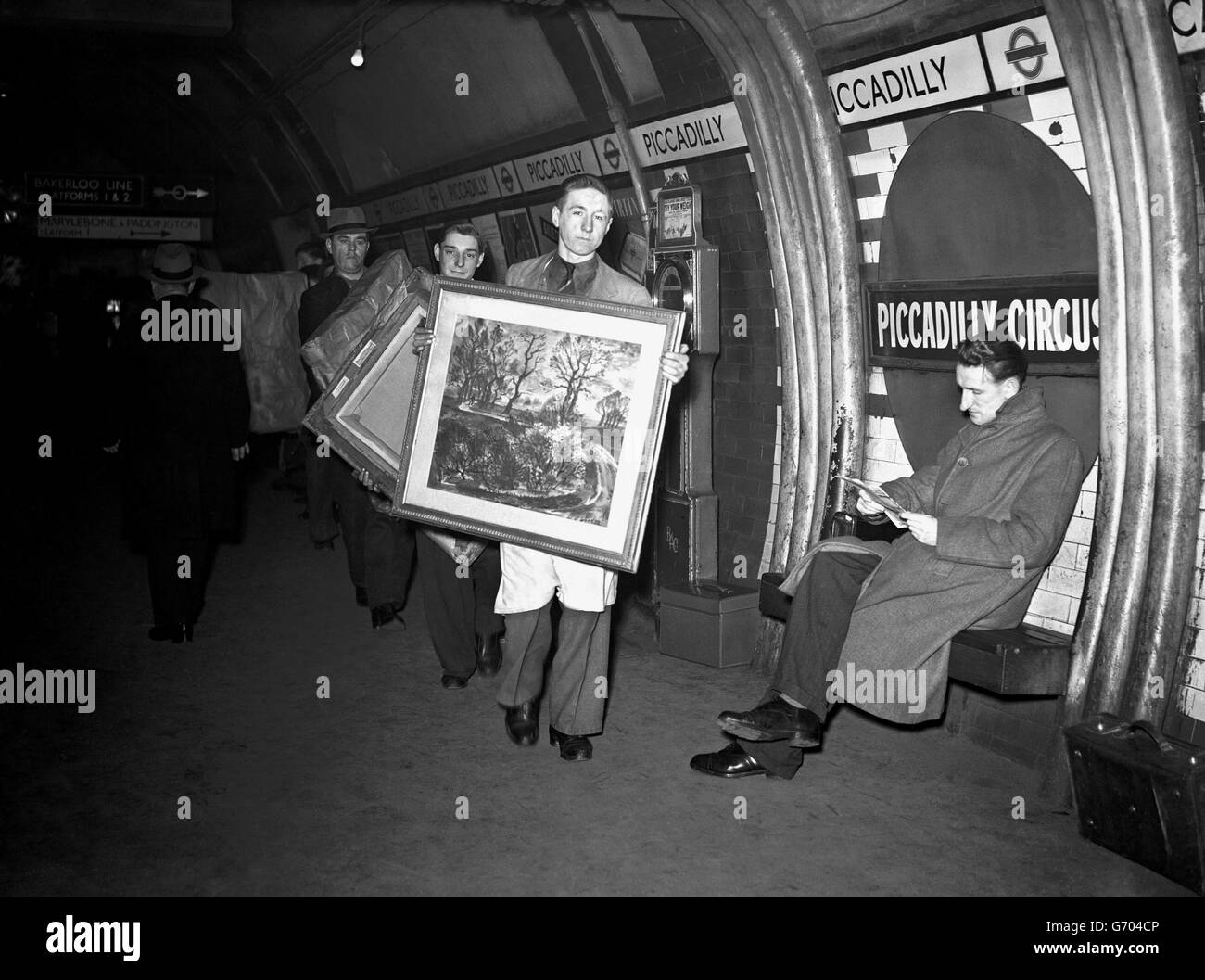 Eighty feet below the surface of Piccadilly Circus is part of the underground station known as 'Aladdins Cave' where national art treasures from the Tate gallery and the London Museum were stored at the outbreak of war. Most of the pictures have been returned to their galleries, but the remaining 200 were taken from the underground under police guard this morning Stock Photo