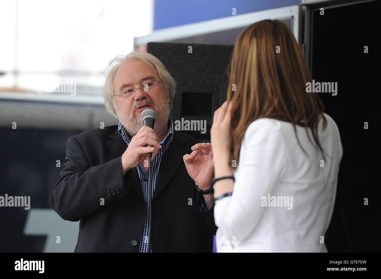 Soccer - Barclays Premier League - Everton v Arsenal - Goodison Park. Mike Parry on stage in the fan zone at Goodison Park Stock Photo