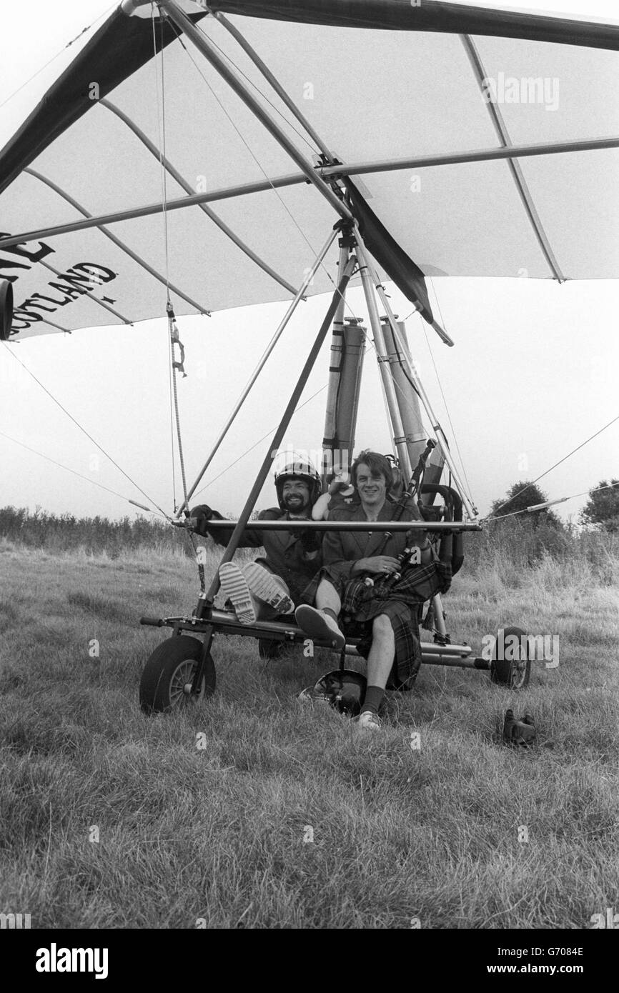 James Potts (l) and John Pilkington, both from Scotland, on the cliffs at Langdon, near Dover, with their two-seater powered hang glider before setting off on their attempt to cross the channel. Stock Photo