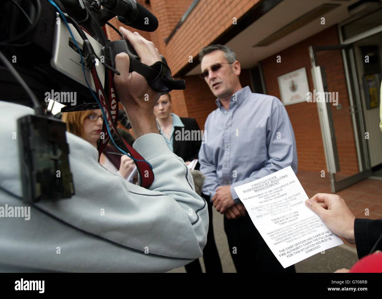 Ian Johnson, representative of the FBU for Salford, speaks to reporters, announcing a meeting a fire brigade headquarters with the intention of reinstating suspended firefighters. Stock Photo