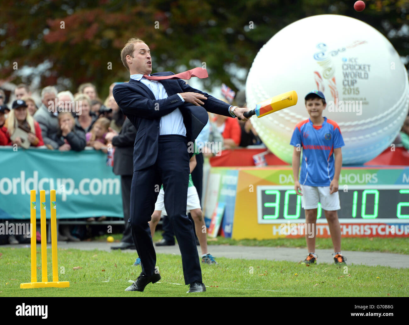 The Duke of Cambridge bats as the Duke and Duchess of Cambridge participate in a 2015 Cricket World Cup event in Christchurch during the eighth day of their official tour to New Zealand. Stock Photo