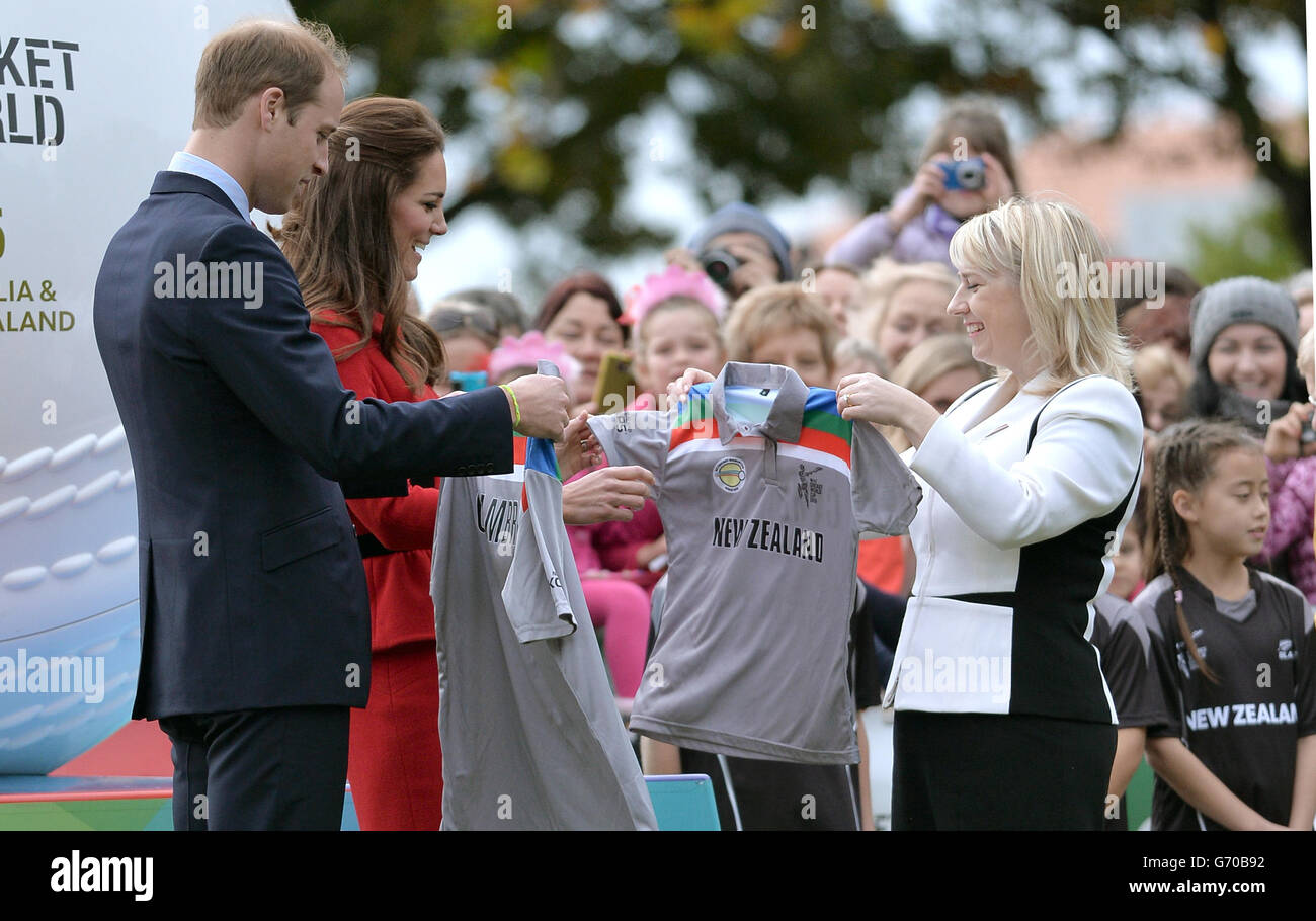 The Duke and Duchess of Cambridge receive cricket shirts as they watch a 2015 Cricket World Cup event in Christchurch during the eighth day of their official tour to New Zealand. Stock Photo