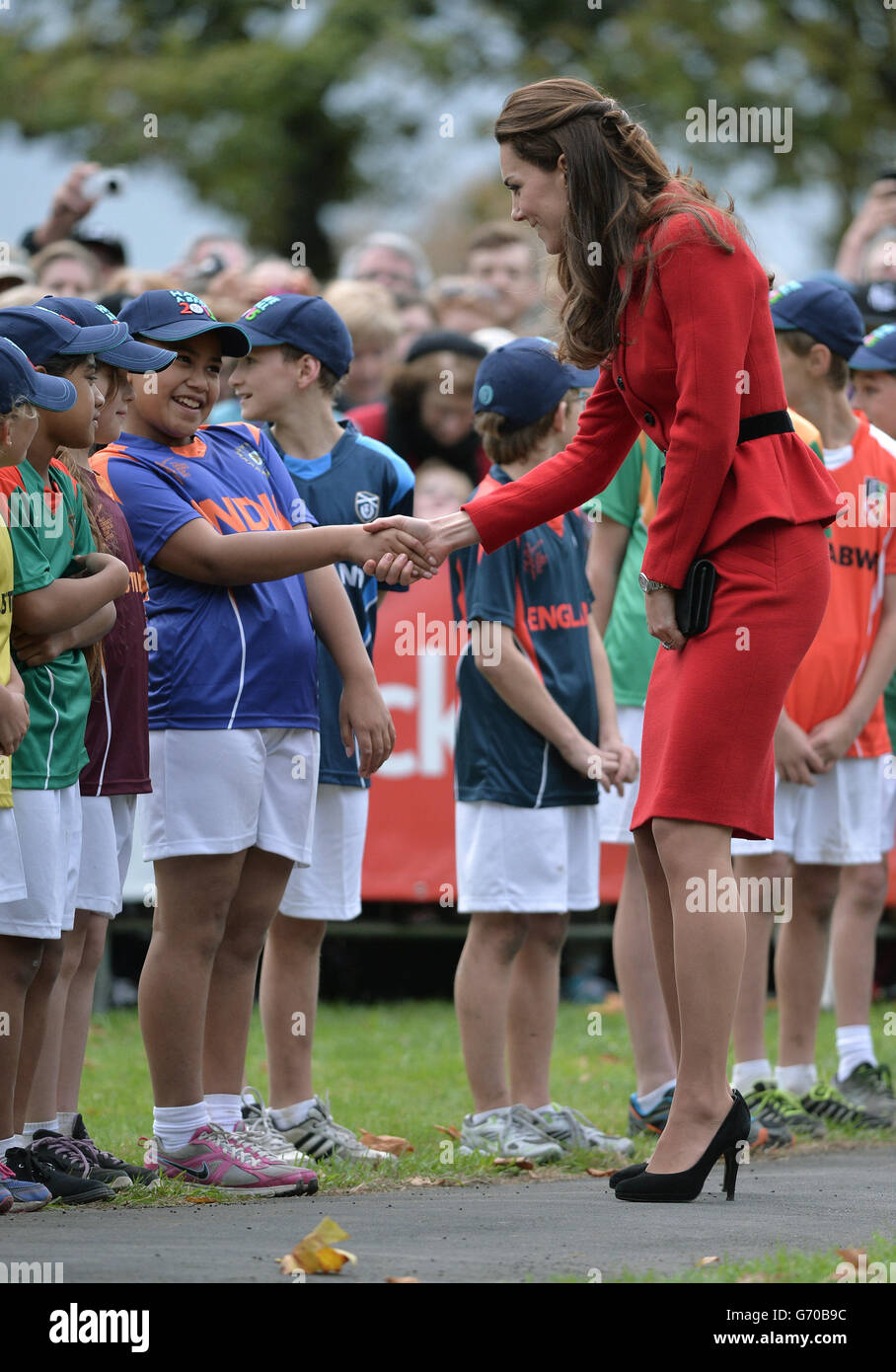 The Duke and Duchess of Cambridge meet children during a 2015 Cricket World Cup event in Christchurch during the eighth day of their official tour to New Zealand. Stock Photo
