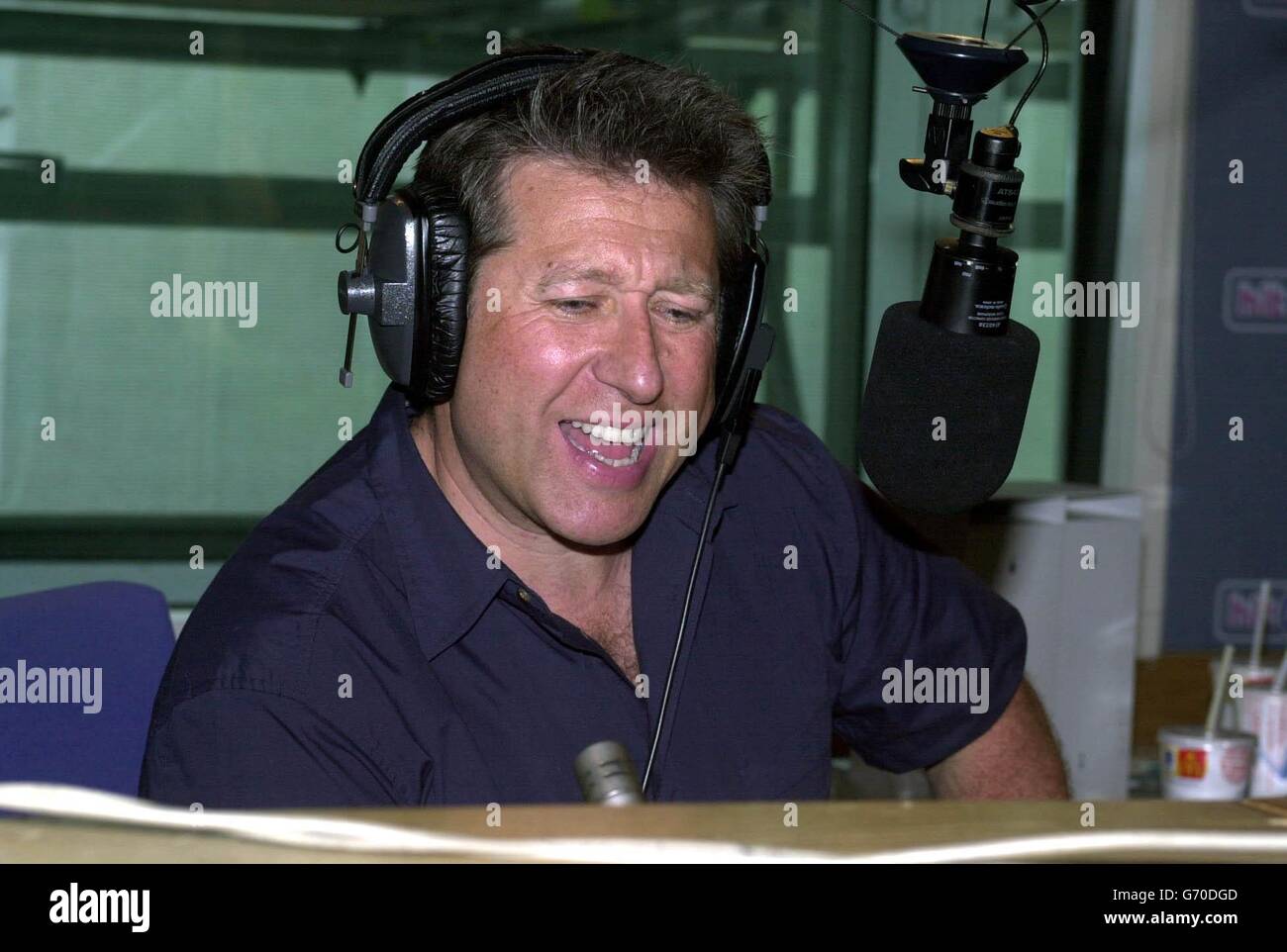 Radio DJ Neil Fox during his final Hit40UK countdown show at Capital Radio in Leicester Square, central London. Stock Photo