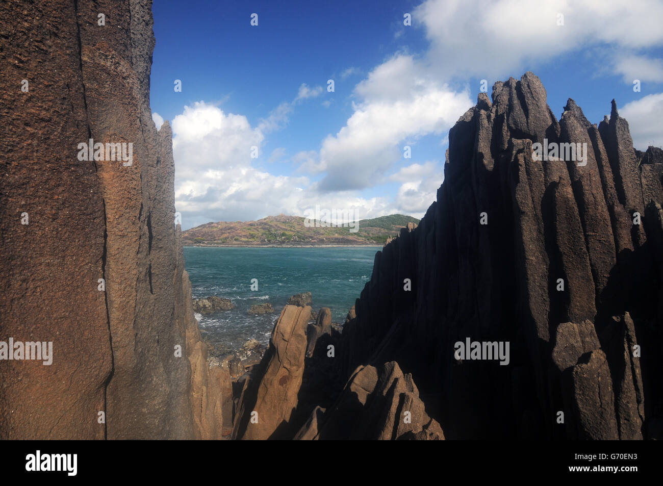 Glimpse of northern tip of Cape York Peninsula from York Island, Torres Strait, Queensland, Australia Stock Photo