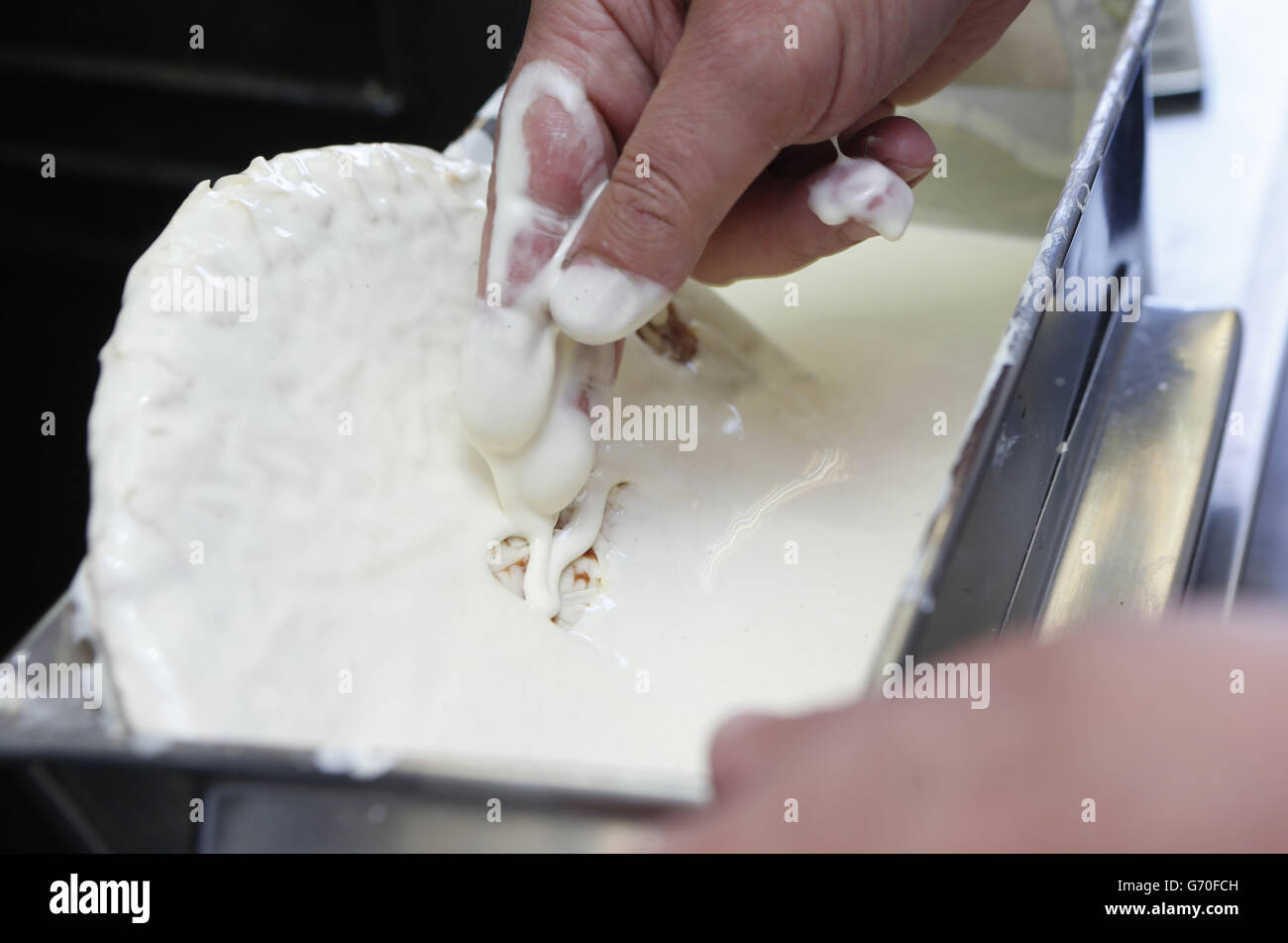 A battered and deep fried pizza, known locally as a pizza crunch, is