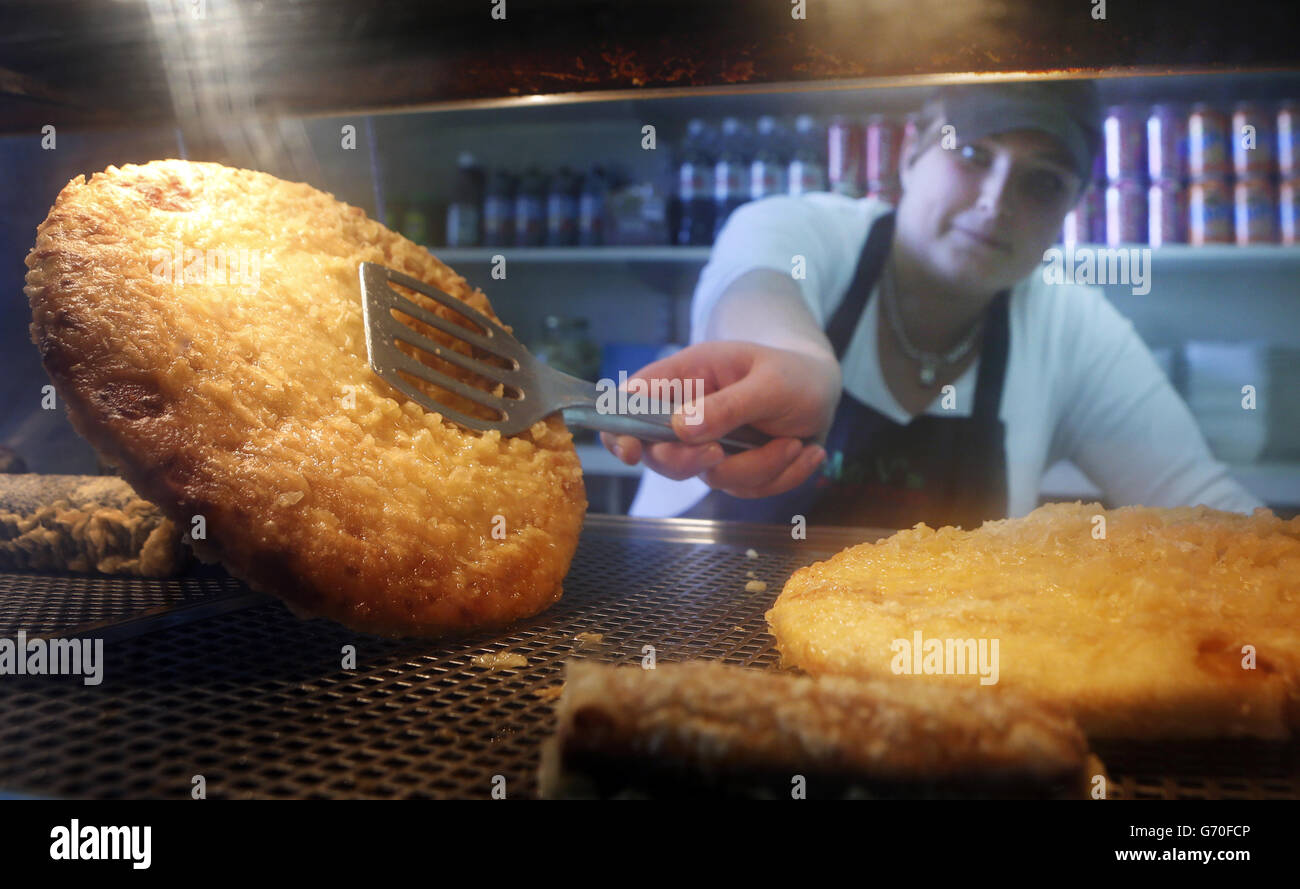 A battered and deep fried pizza, known locally as a pizza crunch and a