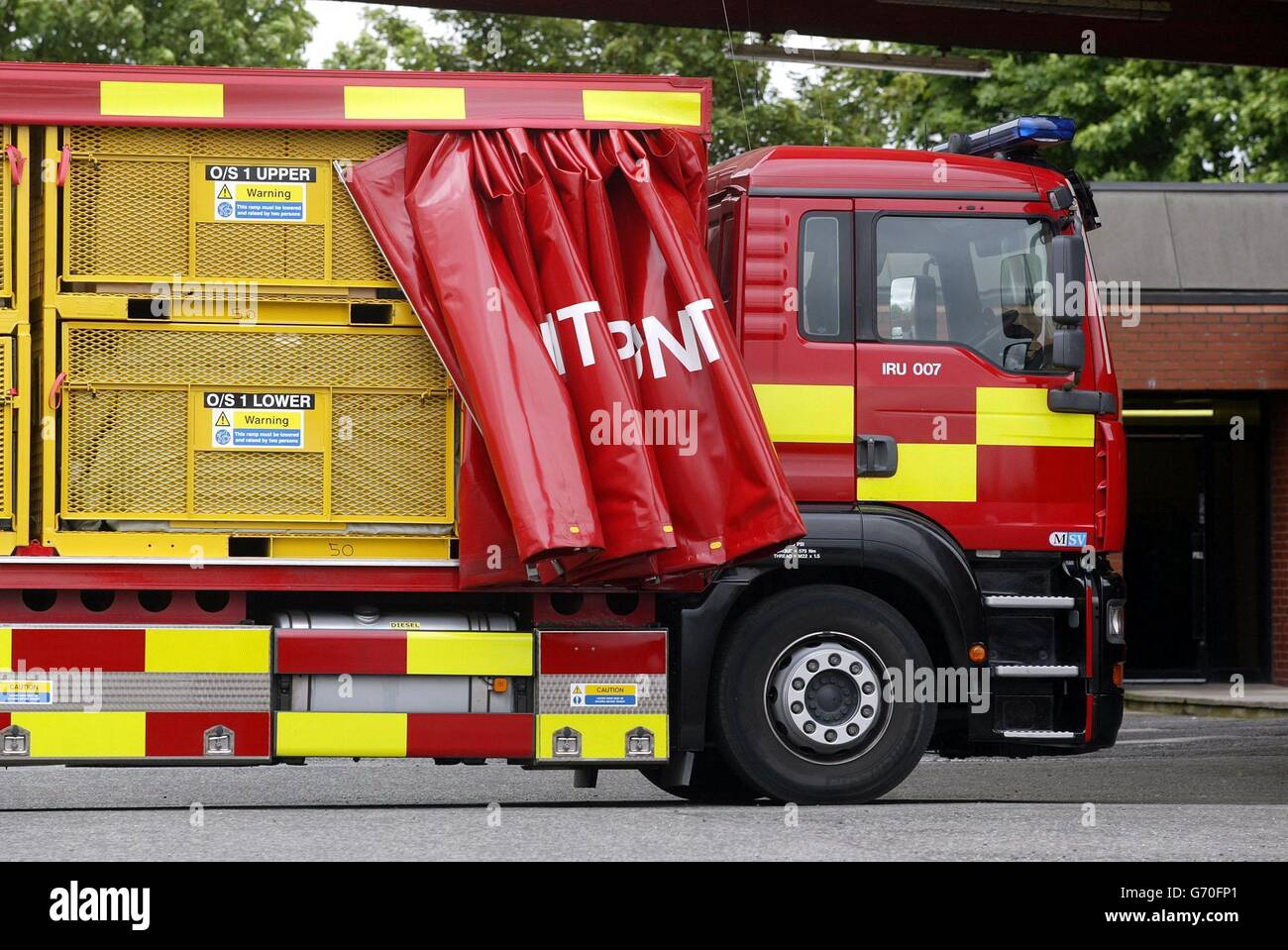 An Incident Response Unit in the appliance yard at Farnworth Fire Station, Greater Manchester. It is similar to the kind of vehicle that has caused the threat of strikes in Greater Manchester, where managers have been accused of 'bully-boy tactics' by the Fire Brigades Union over the suspension of firemen in Salford for refusing to use new anti-terrorist equipment. The row has sparked unofficial industrial action in parts of the UK, threatening to reignite a national strike. Stock Photo