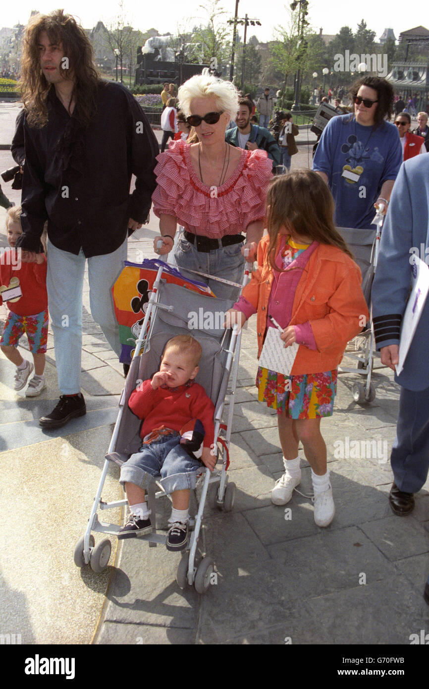 Paula Yates and ex-husband Bob Geldof with their three daughters Fifi Trixie-Belle (r), Peaches (l) and Pixie, during a visit to Euro Disney Resort. Stock Photo