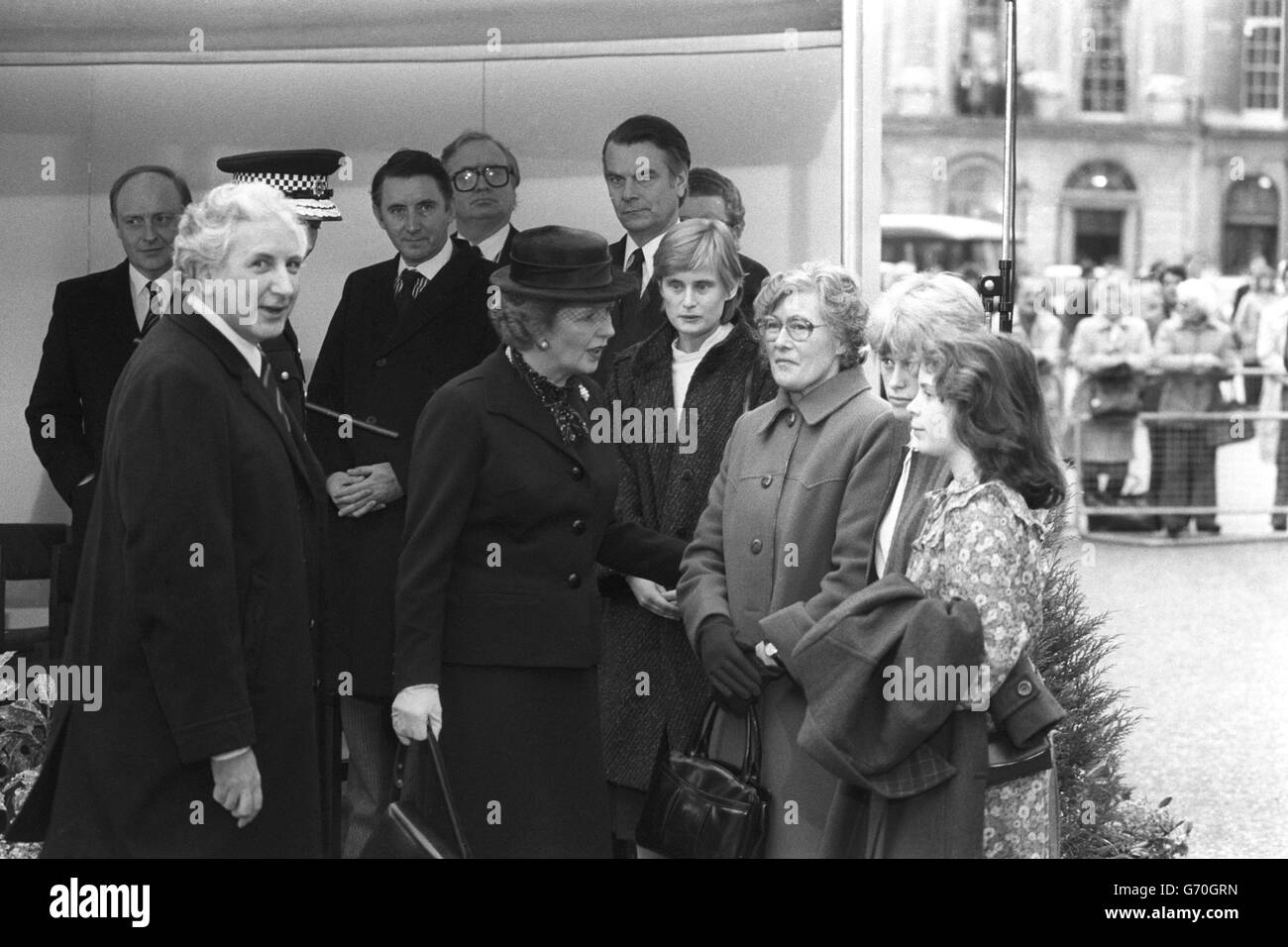 Prime Minister Margaret Thatcher with Mrs Queenie Fletcher, mother of murdered policewoman Yvonne Fletcher, and daughters Heather, Sarah and Debbie in St James's Square, London, to unveil a memorial stone to the WPC near where she was murdered outside the Libyan People's Bureau last April. Stock Photo