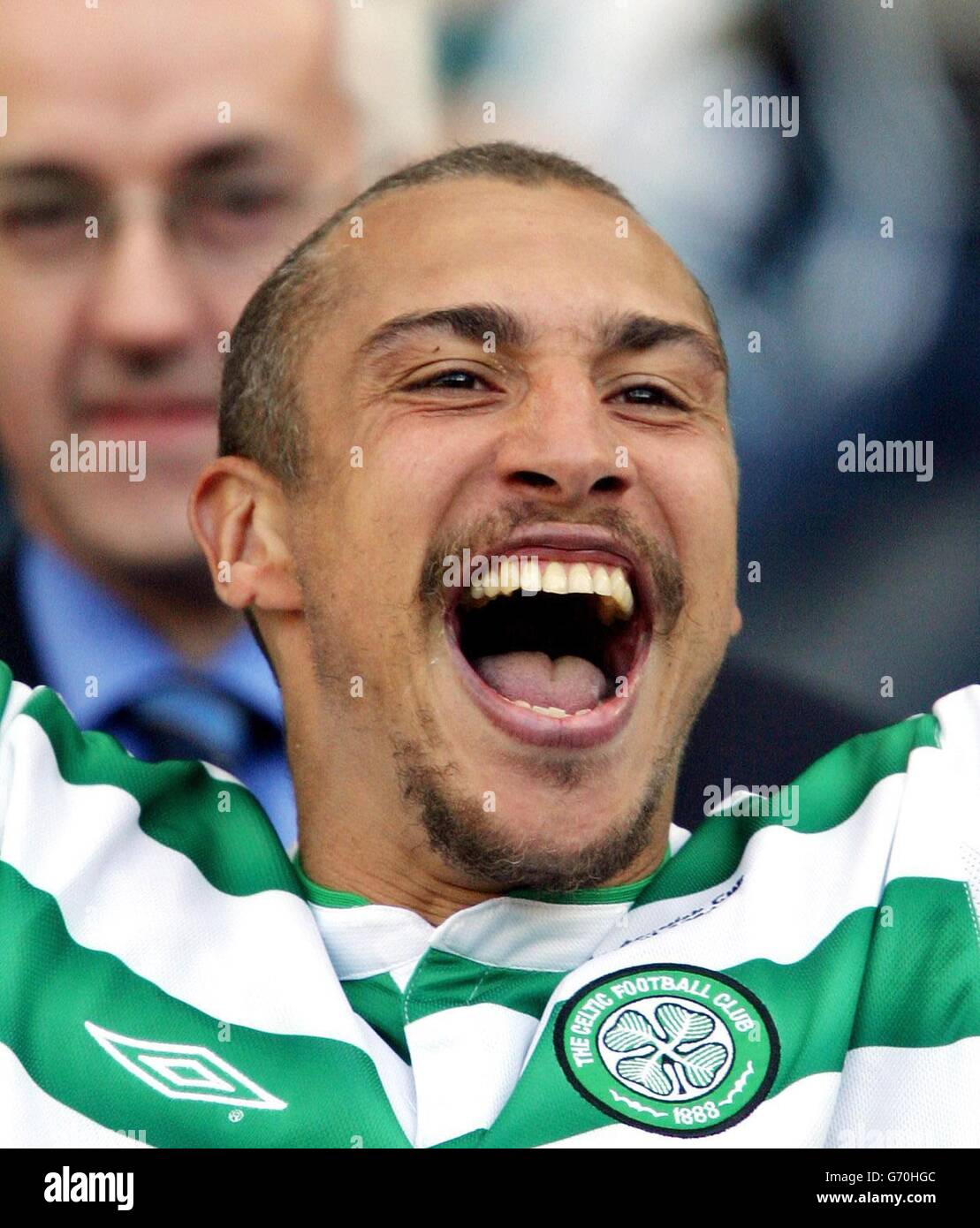 Celtic's Henrik Larsson celebrates his team's victory against Dunfirmline in the Tennent's Scottish Cup Final at Hampden Park, Glasgow. Stock Photo