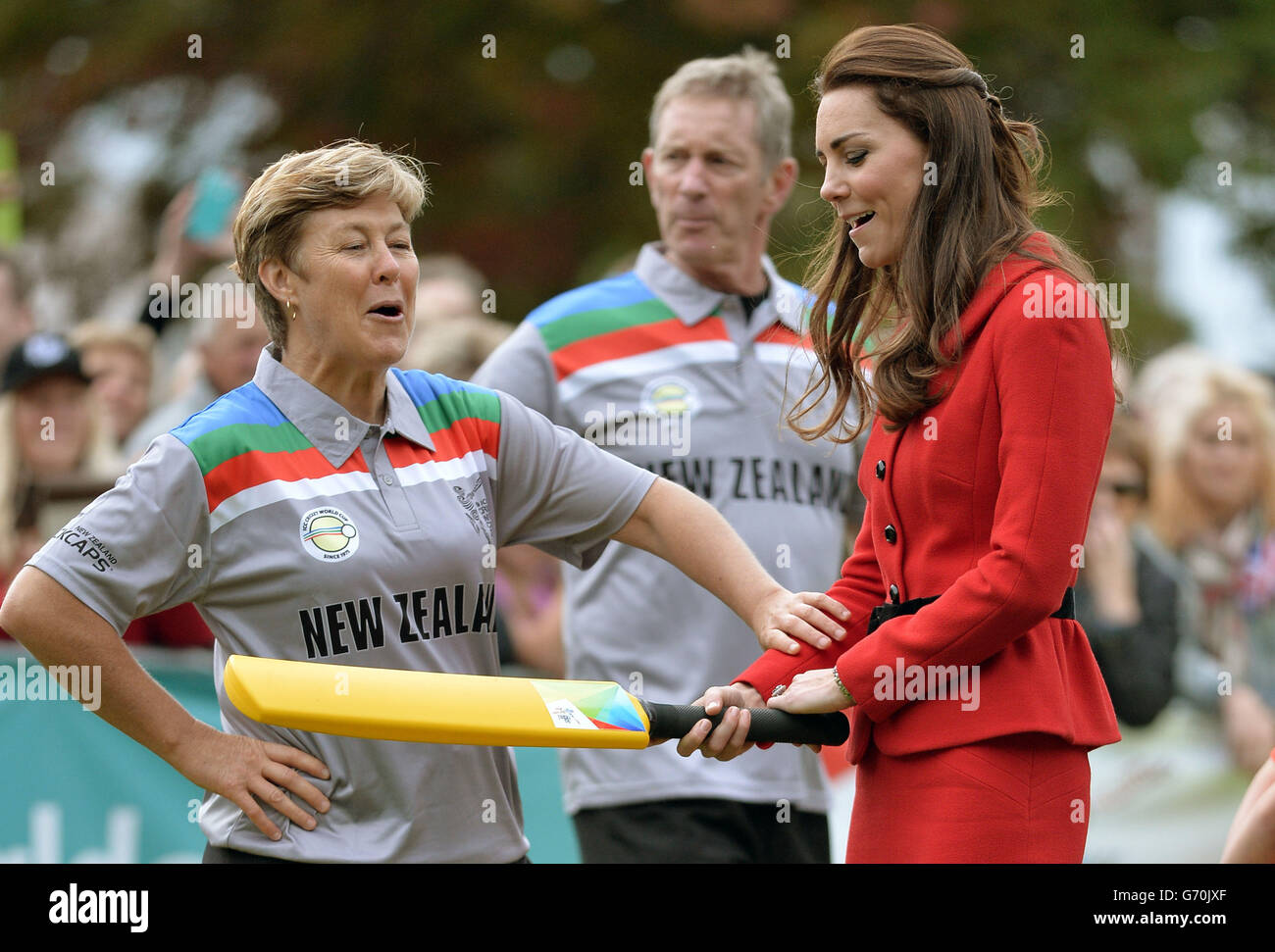 The Duchess of Cambridge prepares to bat to The Duke of Cambridge's bowling as they participates in a 2015 Cricket World Cup event in Christchurch during the eighth day of their official tour to New Zealand. Stock Photo