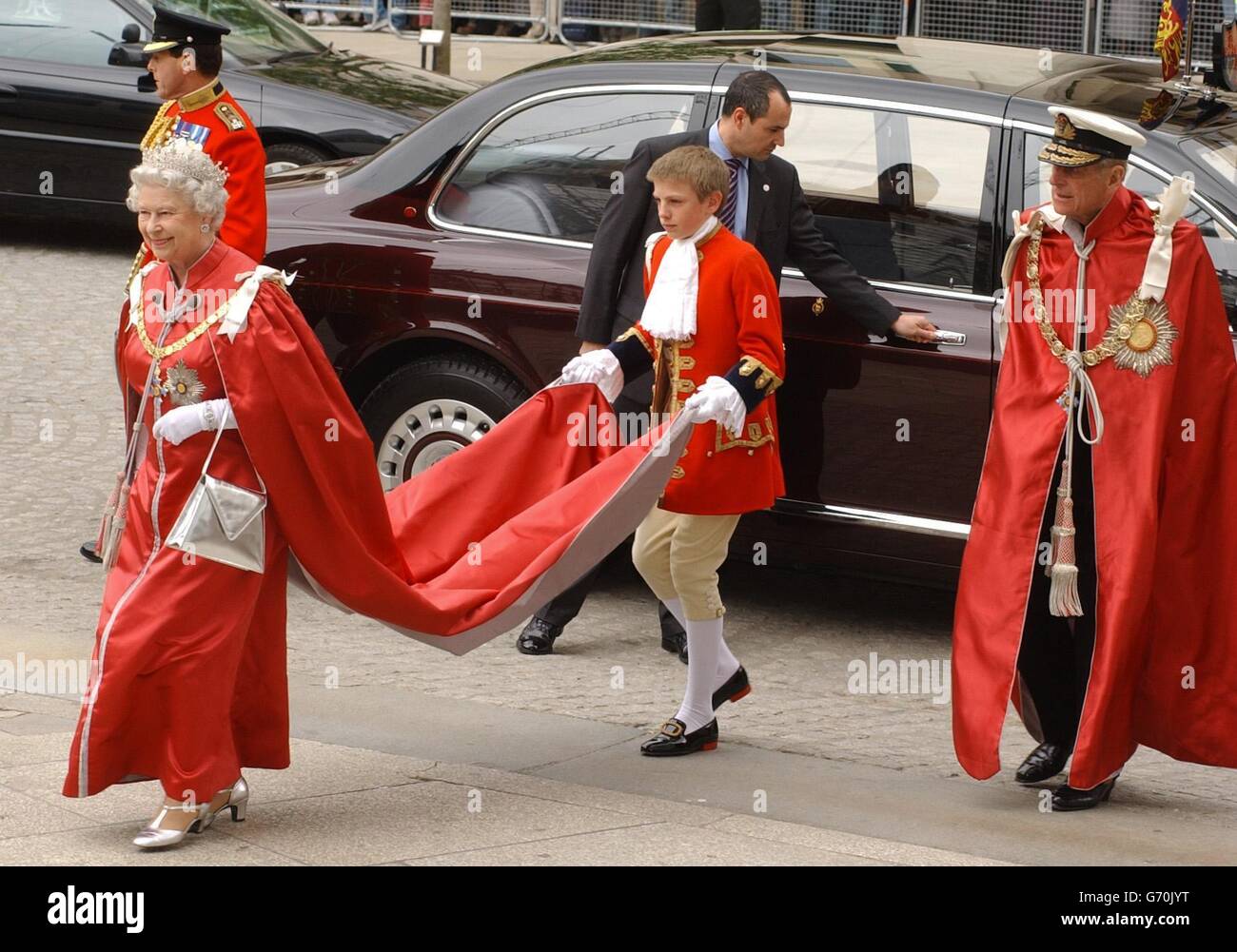Queen Elizabeth II and the Duke of Edinburgh arrive at St Paul's Cathedral in central London to attend a service for the Order of the British Empire. The event, at which around 2,500 holders of KBE, CBE, MBE or OBE medals are present, is held every four years, with the Queen, as Sovereign of the Order of the British Empire, only attending every eight years. Stock Photo