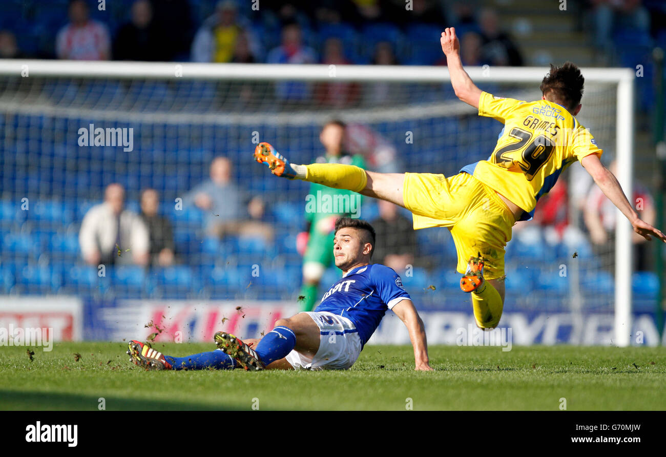 Chesterfield's Samy Morsy red card tackle on Exeter's Matt Grimes during the Sky Bet League Two match at the Proact Stadium, Chesterfield. Stock Photo