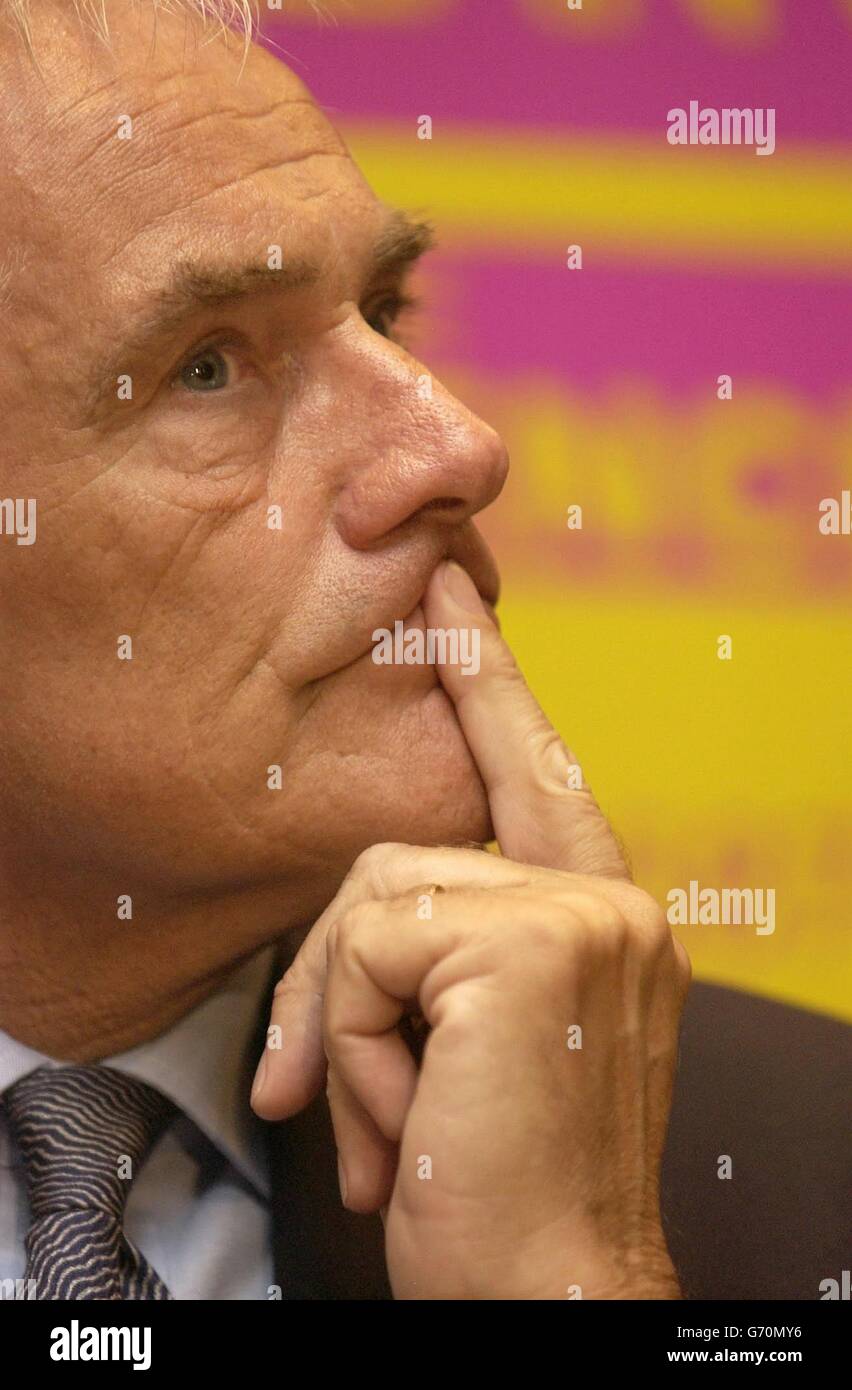 Robert Kilroy-Silk listens intently to questions at a press conference in central London. Mr Kilroy-Silk angrily defended claims by the Conservative Party leader Michael Howard, that a vote for the UK Independence Party was a wasted vote. Stock Photo