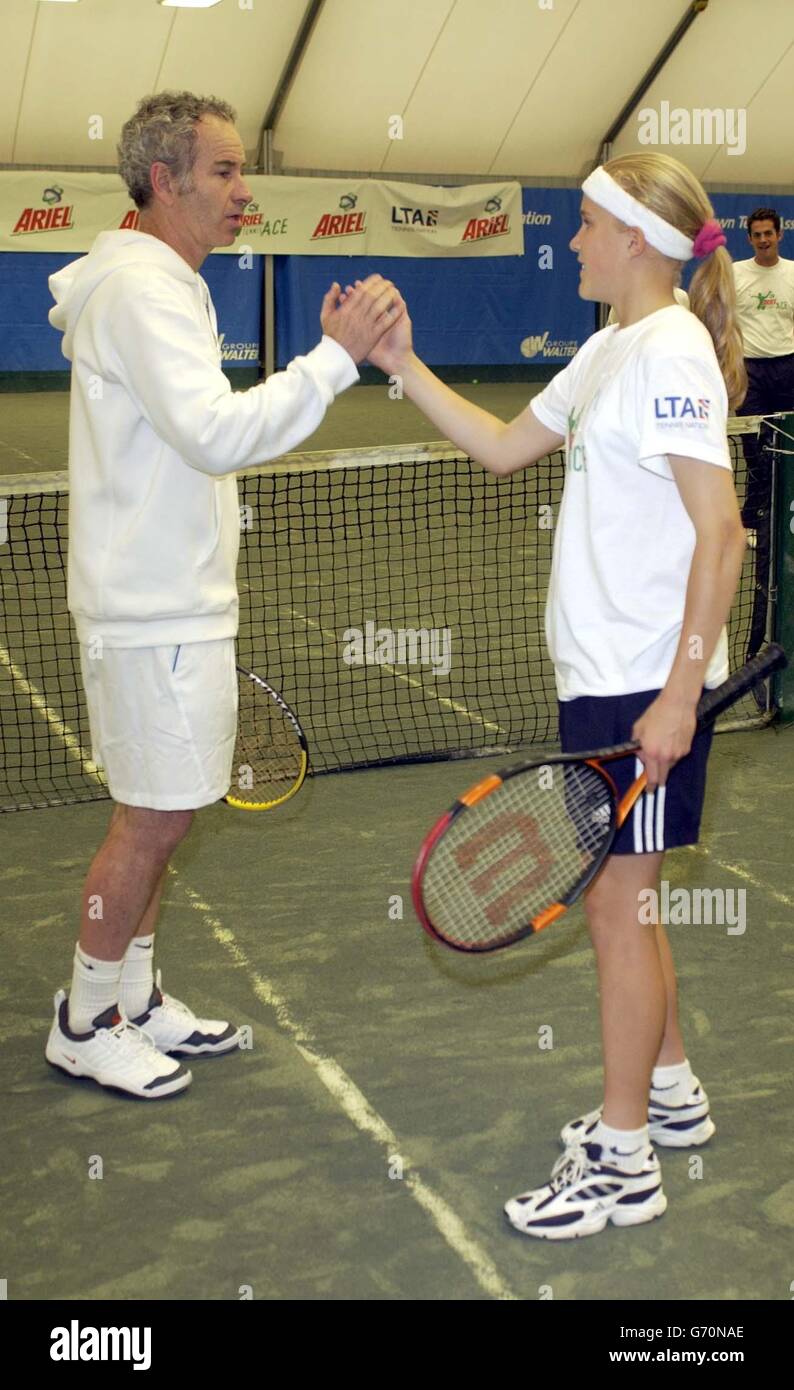 Tennis legend John McEnroe serves up a champion and helps Ariel Tennis Ace  Christie-Ann Brackett, from Essex, get ready the big celebrity Wimbledon  finals on 14th June, at Lawn Tennis Association Academy