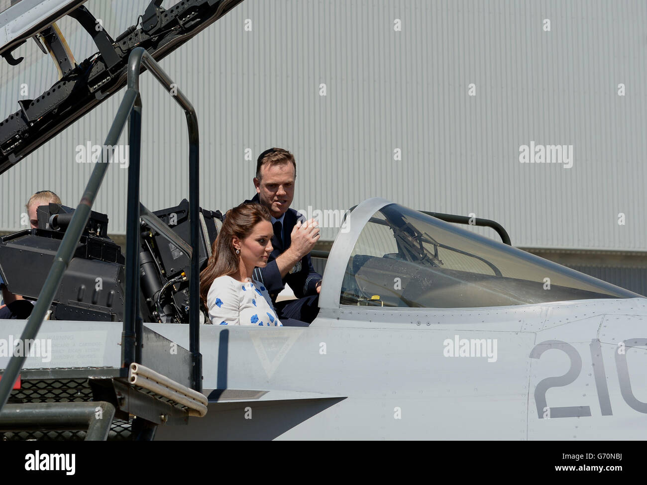 The Duke and Duchess of Cambridge sit in the cockpit of an F/A-18F Super Hornet during a visit to RAAF base Amberley during the thirteenth day of their official tour to New Zealand and Australia. Stock Photo