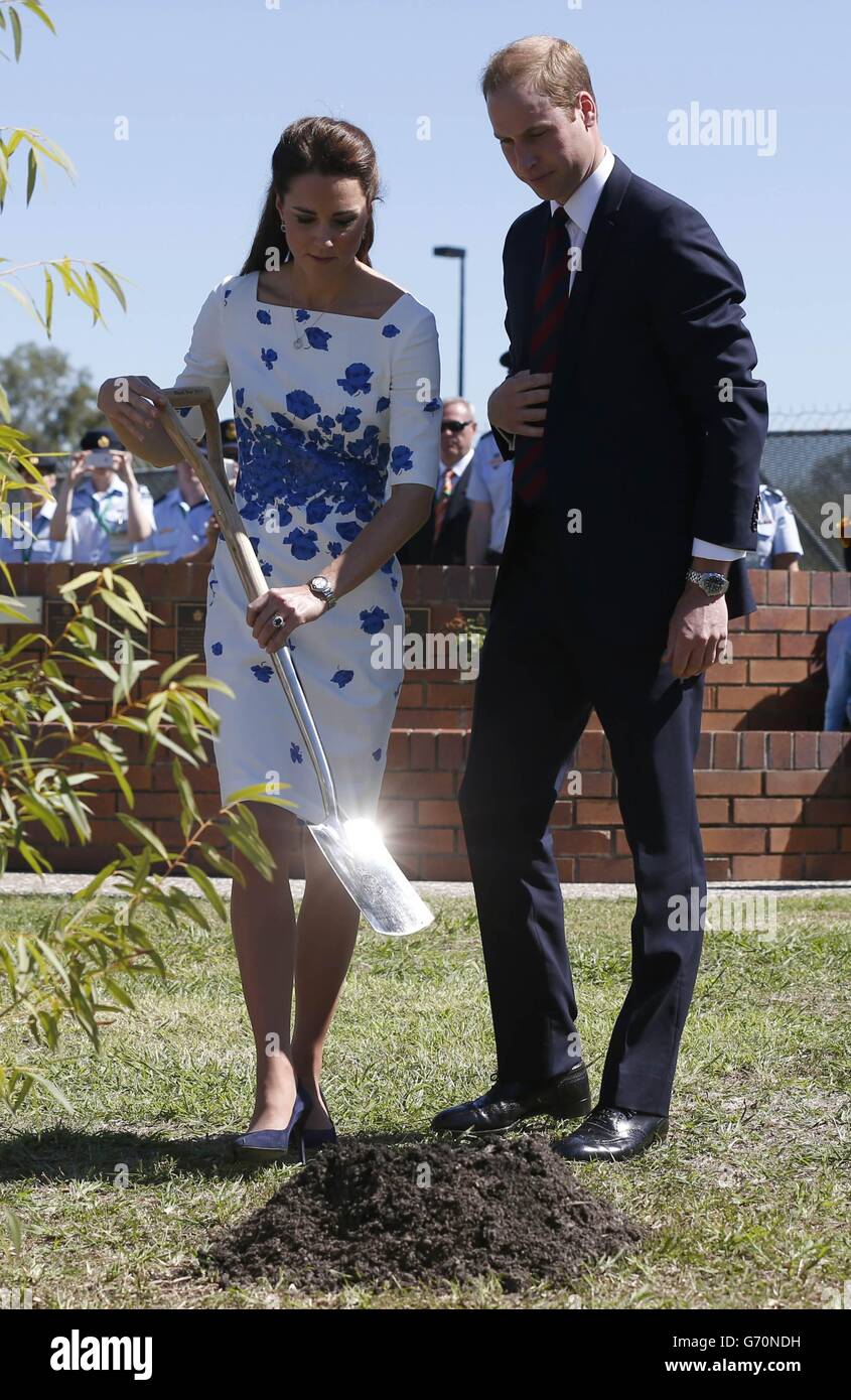 The Duke and Duchess of Cambridge plant a tree during a visit to RAAF base Amberley during the thirteenth day of their official tour to New Zealand and Australia. Stock Photo