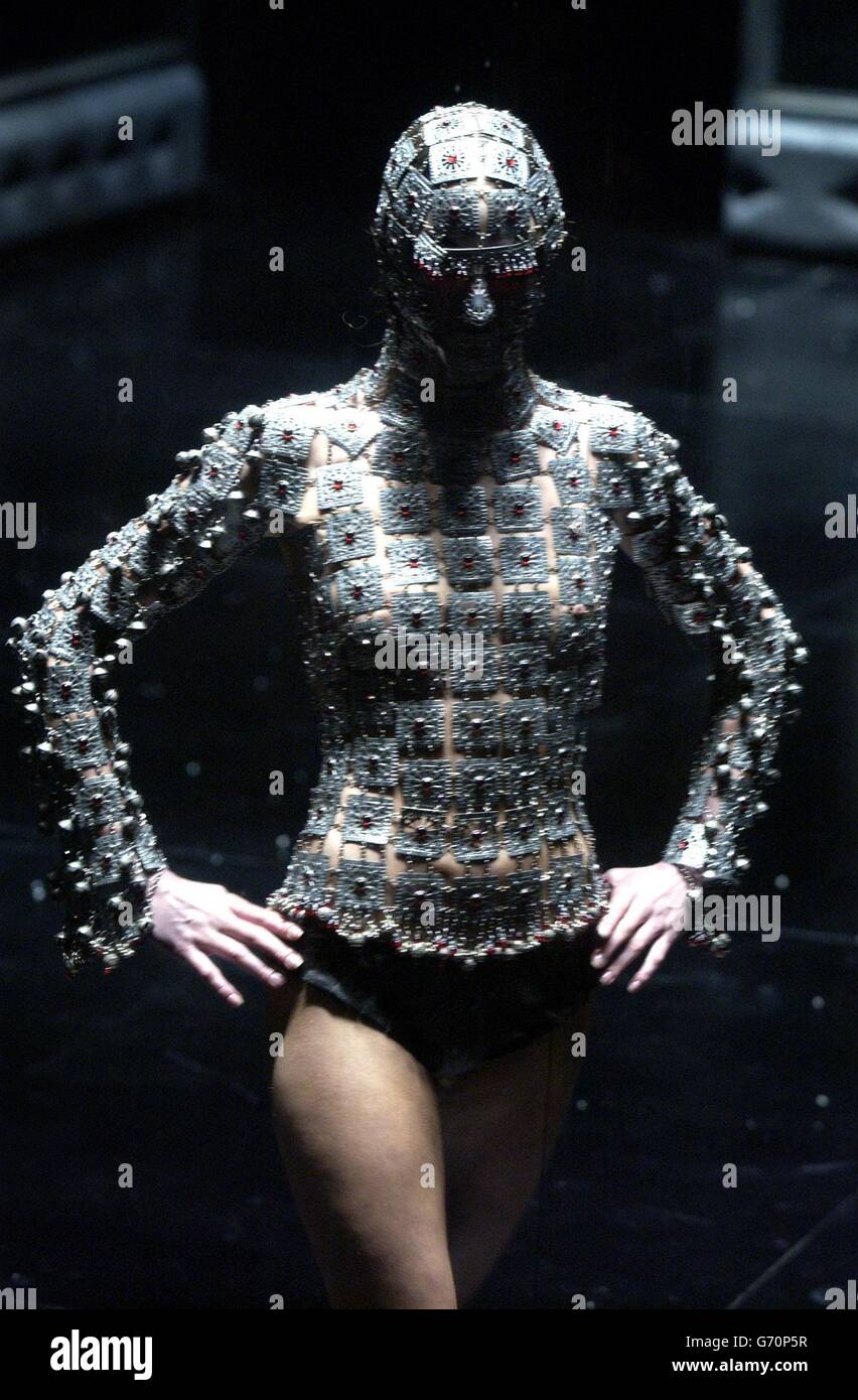 A model during fashion designer Alexander McQueen's 'Black' Fashion Show and party, to celebrate five years of the American Express Centurion Card, at Earls Court Exhibition Centre in central London. Stock Photo