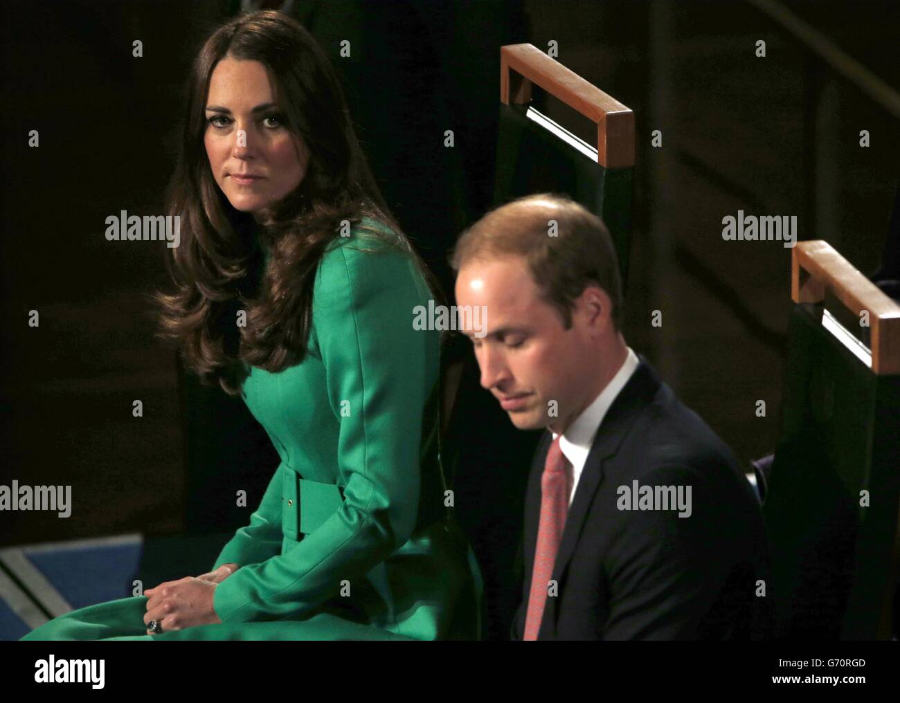 The Duchess of Cambridge, sits next to the Duke of Cambridge in the Great Hall at Parliament House in Canberra. The royal couple are on a 19-day official visit to New Zealand and Australia with their son George. Stock Photo