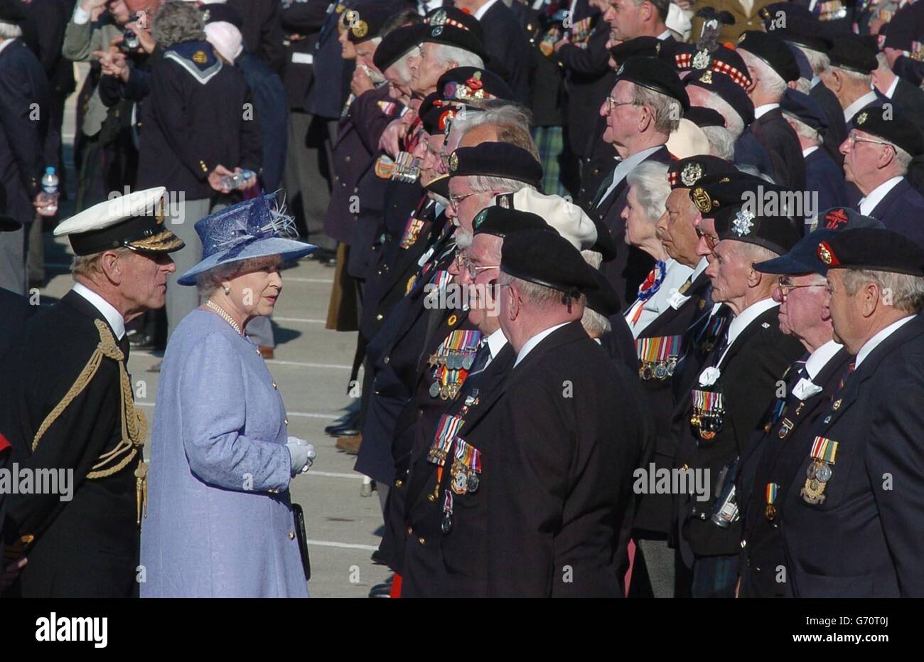 Britain's Queen Elizabeth II and the Duke of Edinburgh talk to D-Day ...