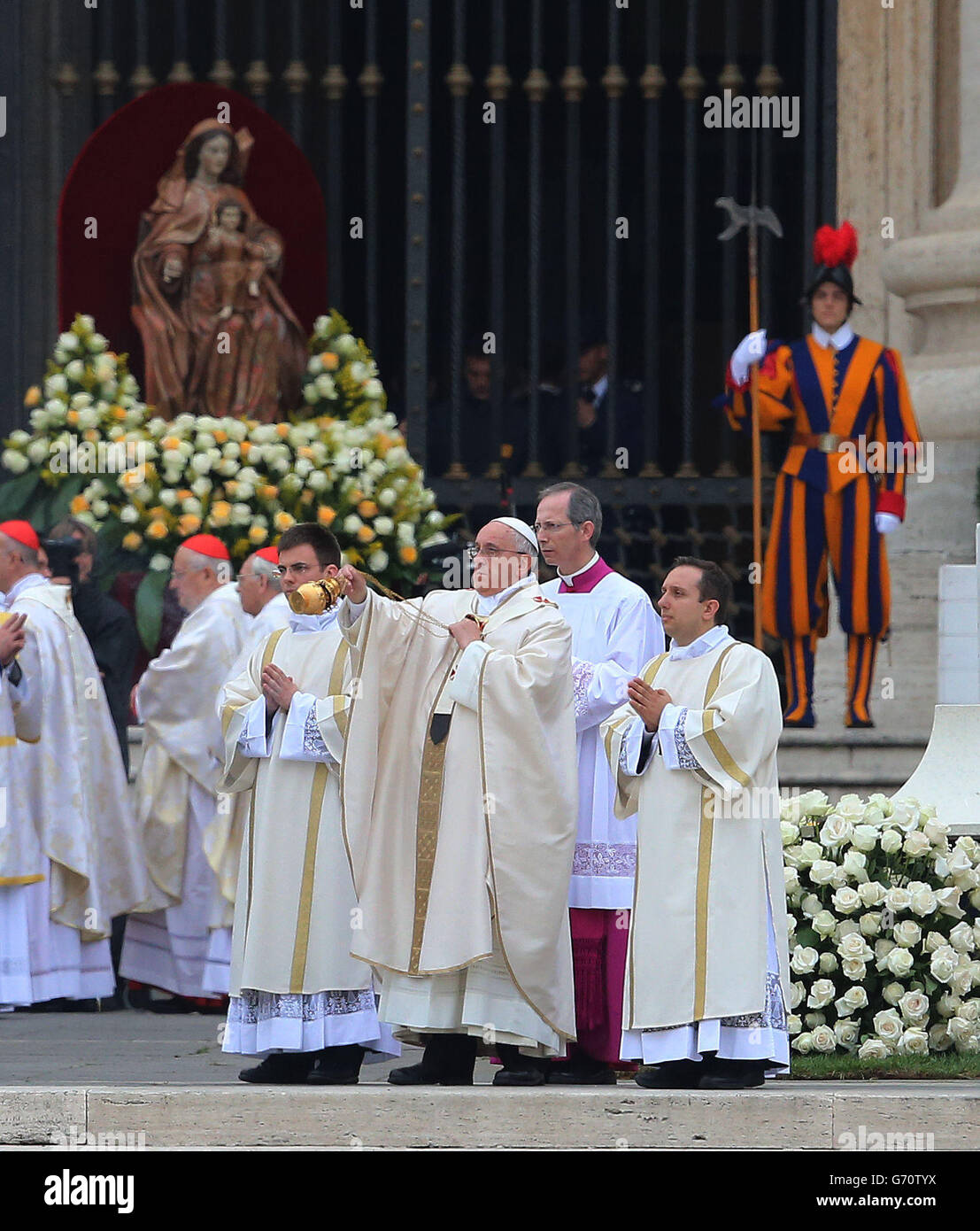 Pope Francis (centre) takes part in the historic canonisation of Popes