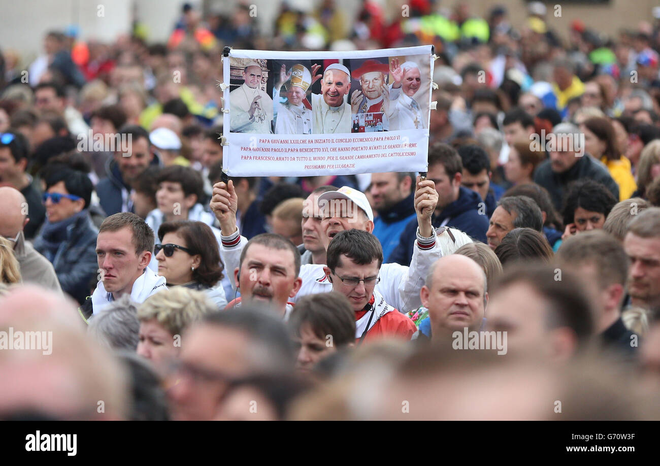 The faithful in St Peter's Square in Rome during the historic canonisation of Popes John XXIII and John Paul II. Stock Photo