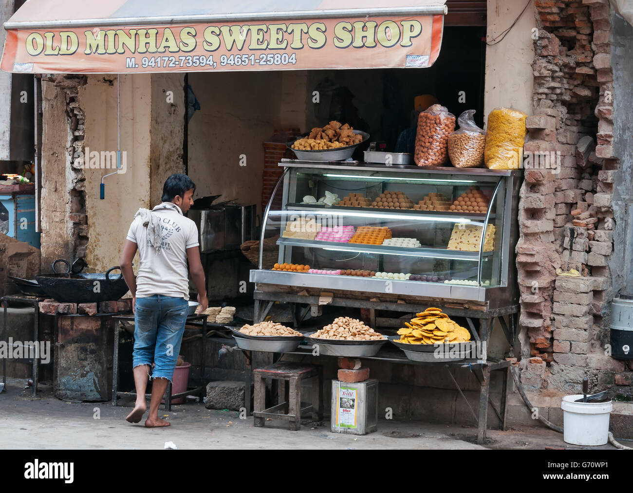 Indian local sweet and snack shop.  Amritsar home to the Harmandir Sahib (Golden Temple) Stock Photo