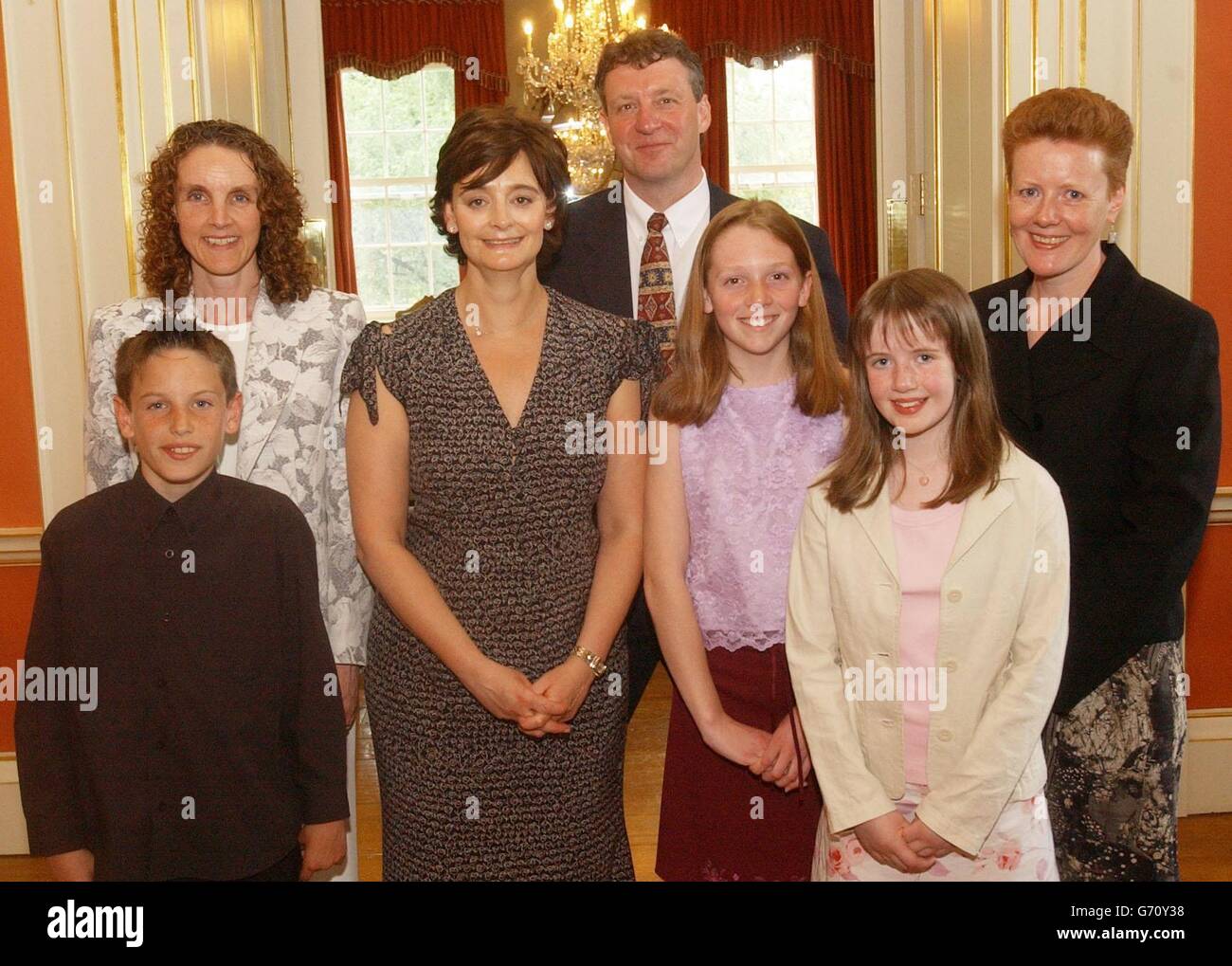 Cherie Blair (2nd left front) with (left to right front) Tristram Masters, Lisa Brennan and Henrietta Hammant, (l/r rear  Mrs Sharon Masters, Quentin Davies MP Grantham & Stamford, at 10 Downing Street, in central London. The Prime Minister's wife was holding a regular tea party to which school children are invited with their local MP's. Stock Photo