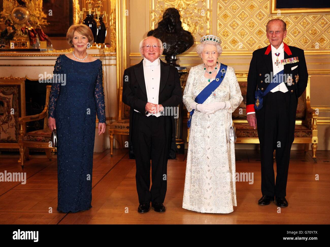 Sabina Coyne, President of Ireland Michael D. Higgins, Queen Elizabeth II and the Duke of Edinburgh attend a State Banquet at Windsor Castle during the first State visit to the UK by an Irish President. Stock Photo